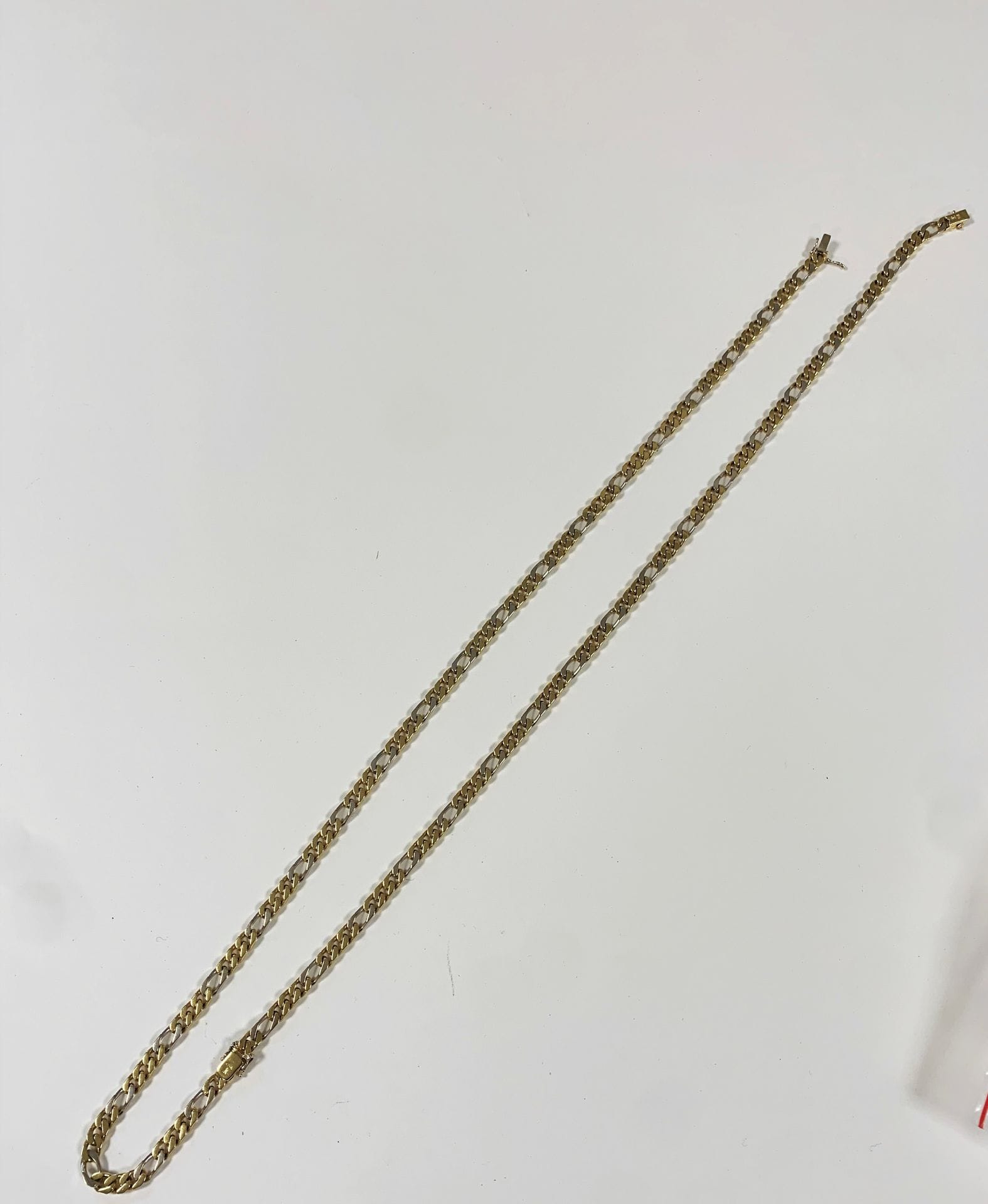 2 chaines en or (18K) à maillons gourmette 2 ors.Poids : 114 g