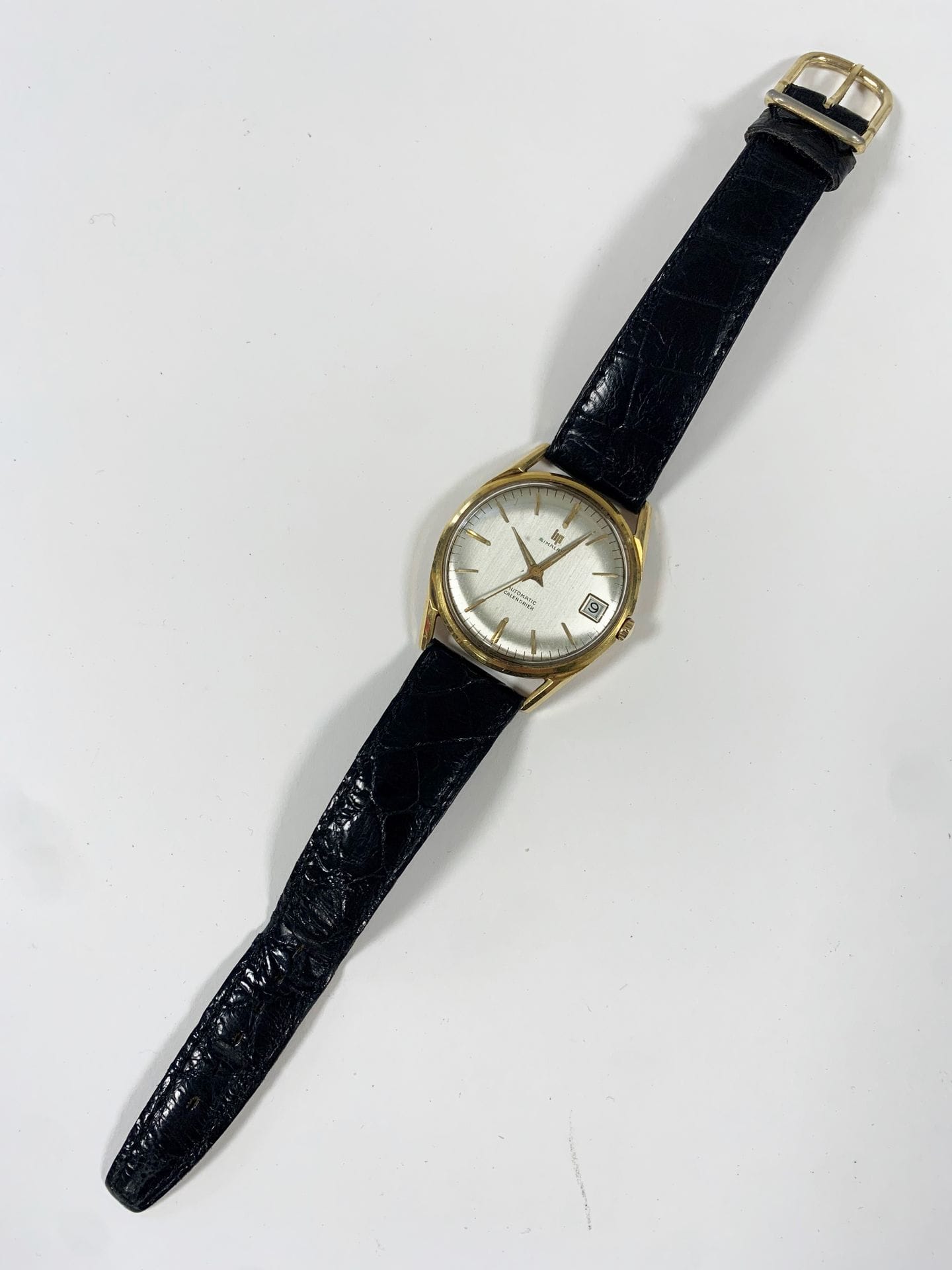 LIP Himalaya: Montre bracelet d'homme, cadran en or (18K), bracelet cuir, boucle métal.
Poids brut : 38,6 g