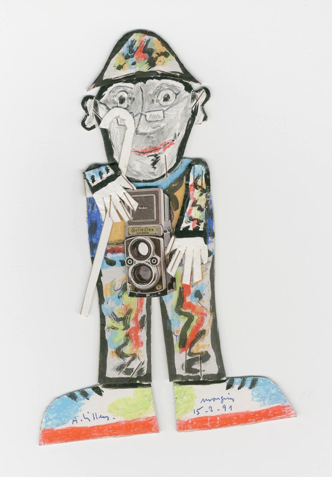 André Villers (1930-2016)
Autoportrait en photographe, 15 février 1991. 
Collage, feutre et gouache sur carton. Signature du photographe, annotation "Photographe débile (autoportrait) … je n'accuse personne", date et dédicace "Pour Denise David, amitié" à l'encre. 
22,5 x 14,5 cm

André Villers (1930-2016)
Self-portrait as a photographer, February 15, 1991. 
Collage, ink and gouache on cardboard. Signature of the photographer, annotation "Photographe débile (autoportrait) ... je n'accuse personne", date and dedication "Pour Denise David, amitié" in ink. 
22,5 x 14,5 cm