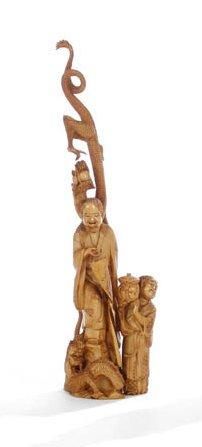 Japon, 1900
Okimono en ivoire à patine jaune représentant un Rakan debout sur un rocher entouré de deux dragons pourchassant la perle sacrée et un enfant portant un vase. Signé Masayuki. Accidents, manques et restaurations. H.: 35 cm