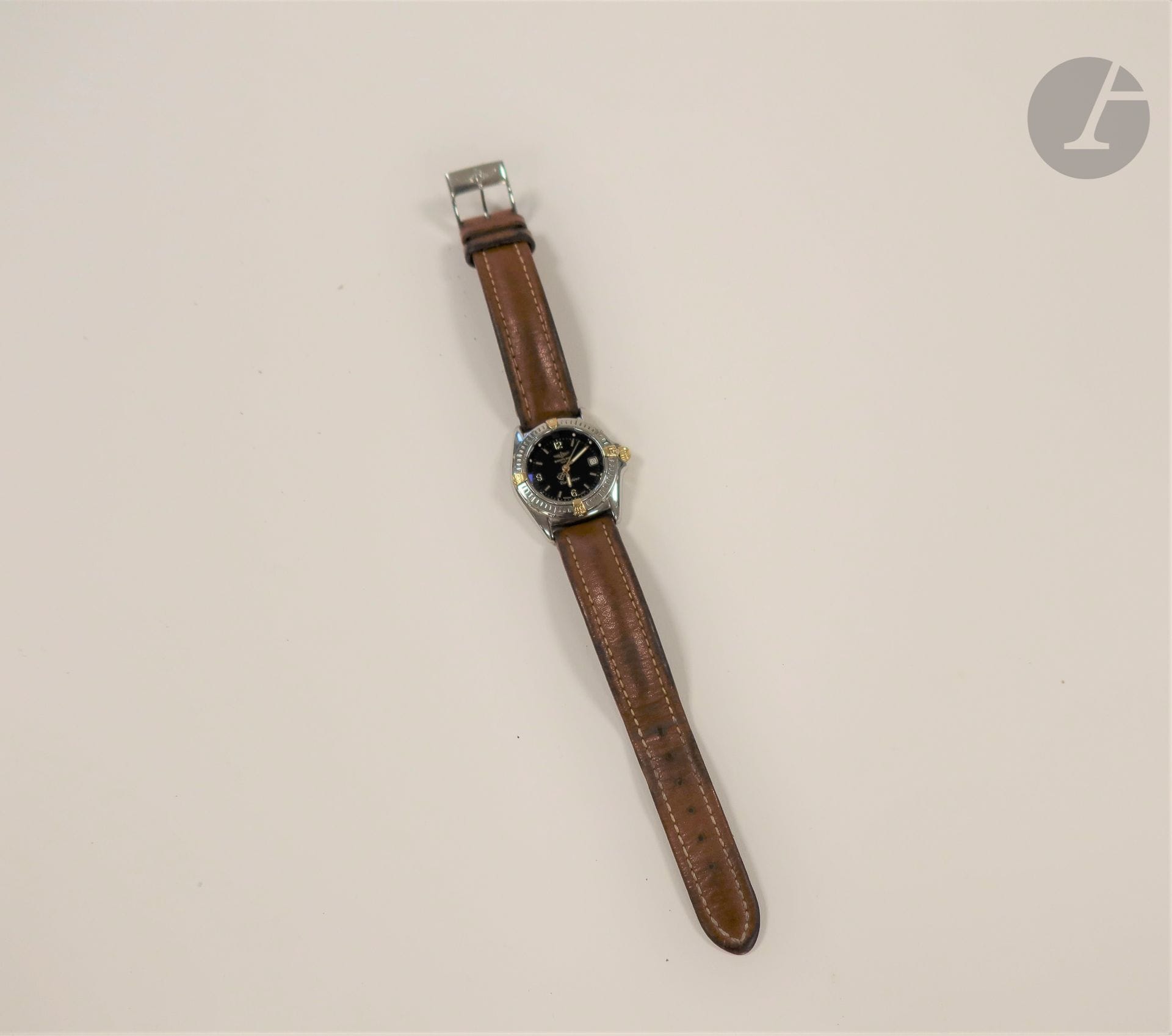 BREITLING model Callistino 

Steel woman's wrist watch with black dial and quartz movement (works) leather strap with steel pin buckle.