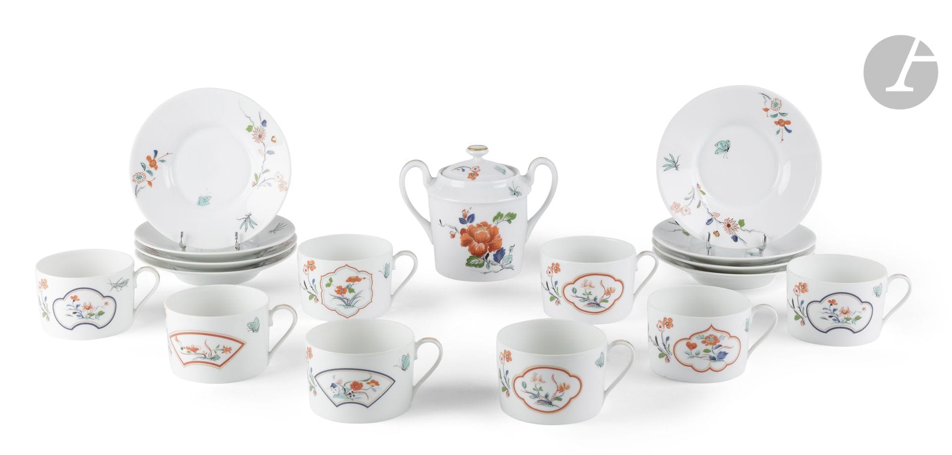 Limoges and Christian Dior
Eight teacups, eight saucers and a sugar pot in porcelain with polychrome decoration in the Kakiemon style of flowers and medallions.
XXth century