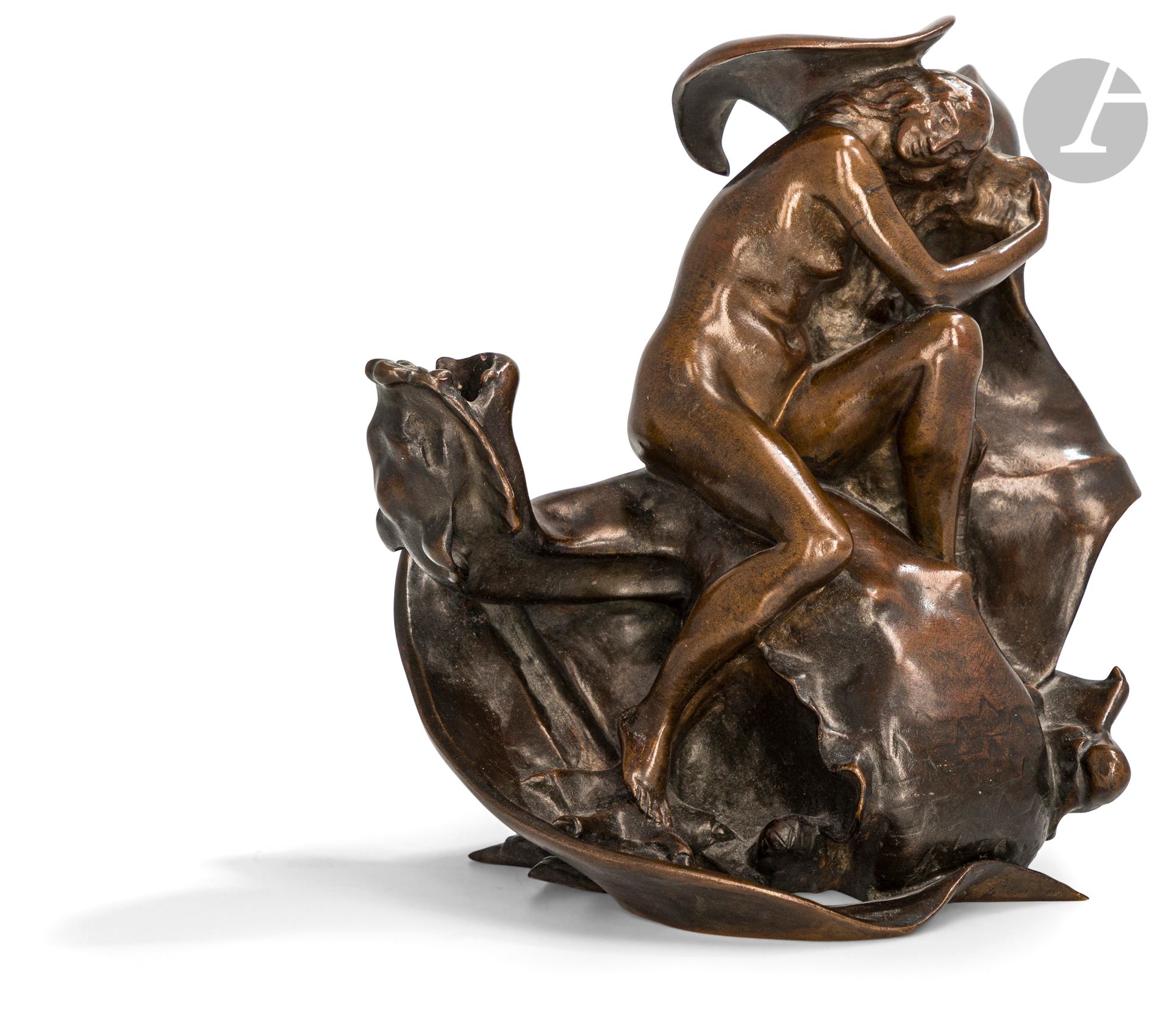 Félix Voulot (1865-1954)
Femme et dragon
Bronze à patine brune
Signé «F. Voulot» à l’arrière 
H : 22 cm 

Littérature en rapport : 
Charles-Guillaume Janneau, «La vie artistique : L’exposition Félix Voulot», dans Gil Blas, 2 mai 1911, 12497, p. 2

Le sculpteur de ce bronze original et fantaisiste est Félix Voulot, élève de l’Académie de Nancy puis de Paris. Le sculpteur s’attache particulièrement au travail de la lumière afin de rendre les formes légères, élégantes et harmonieuses. 
Plusieurs œuvres de Félix Voulot sont conservées au musée d’Orsay à Paris.