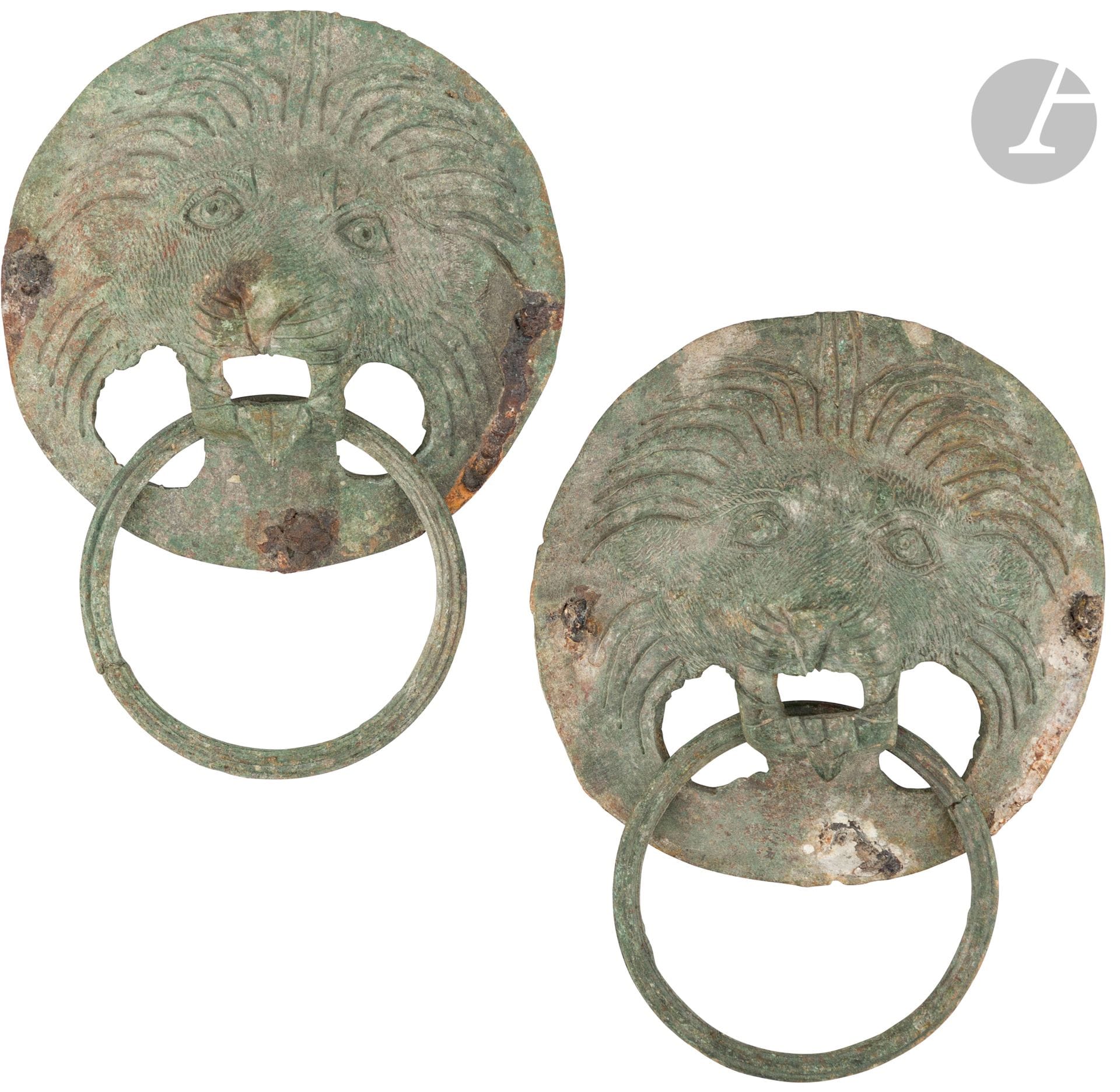 Pair of sconces depicting lions' headsA
ring is placed in the mouth.
Roman period, 2nd-4th century.
Bronze. Nice incision work.
Diameter : 11 cmA

pair of Roman bronze Lion's head applique, 2nd - 4th centuryCollection

Madame et Monsieur Magloire







