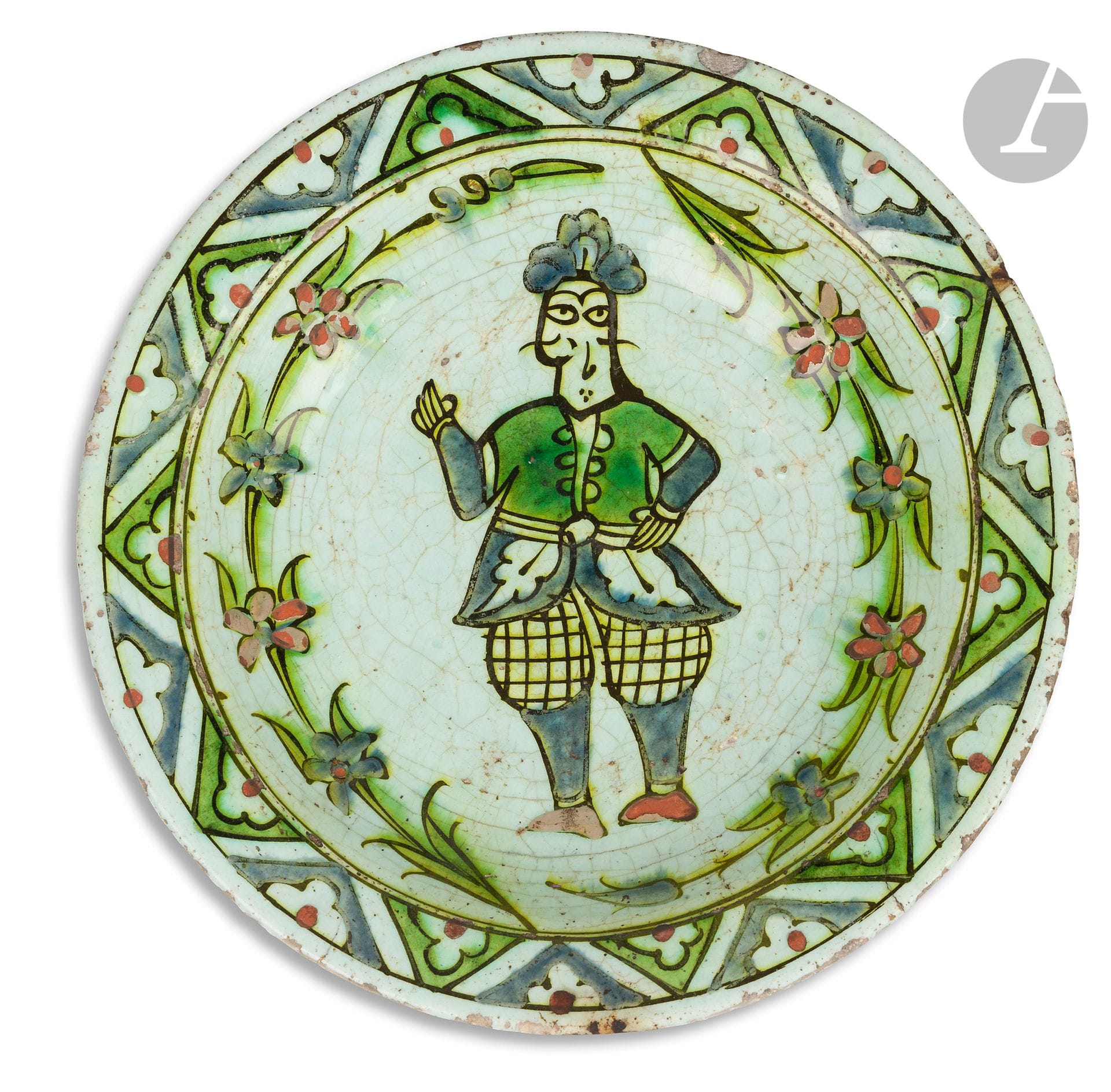 Tabak dish decorated with d'homme au şalvar quadrille, Ottoman Turkey, Iznik, second half of the 17th
centurySiliceous ceramic
dish
with underglaze painted decoration of a man with squared-off bloomers (şalvar), framed by two garlands of rosettes. Marli decorated with chevrons sheltering half rosettes.
Diameter : 29 cmMany
chips and cracks, holes in the suspension, enamel jumps.

This dish is to be compared with a dish from the Ömer Koç Collection reproduced in Hülya Bilgi, Iznik Ömer Koç Collection, Istanbul : 2015, n°247, p. 518. 

A tabak dish with a man, Ottoman Turkey, Iznik, second half of the 17th century






