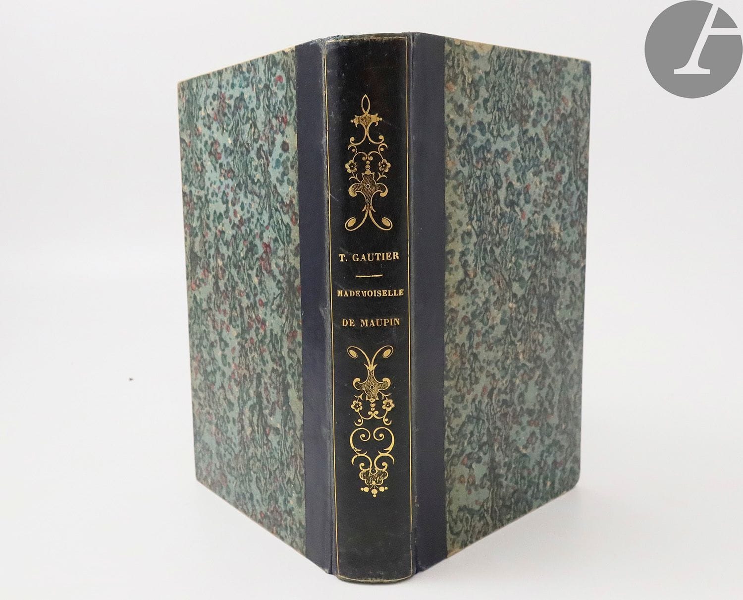 GAUTIER (Théophile).
Mademoiselle de Maupin. Double Amour.
Paris : Eugène Renduel, 1835-[1836]. — 2 tomes en un volume in-8, demi-basane bleu foncé, dos lisse orné, tranches mouchetées (reliure de l'époque).
Rare édition originale de la première œuvre importante de Théophile Gautier, célèbre notamment pour sa fameuse préface qui fit scandale. L’auteur y condamne l’hypocrisie des critiques taxant d’immoralité la littérature de l’époque et propose un véritable manifeste de la théorie de l’Art pour l’art.

Bel exemplaire en reliure de l'époque. Il est malheureusement incomplet du faux titre et du titre du second tome, retirés volontairement au moment de la reliure pour donner une continuité au texte.
Faux titre du premier volume doublé, titre du même volume restauré, mouillures claires, rousseurs, quelques feuillets tachés.