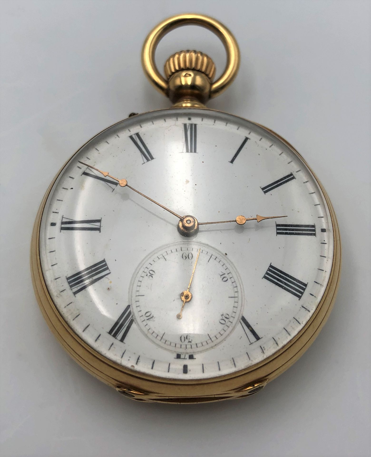 Montre de poche à remontoir en or (18K). Poids brut: 85,1 g
(double paroie)