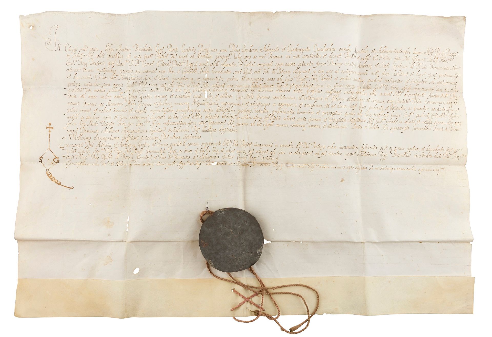 ITALY. Charter, Reggio Emilia Sept. 12, 1600; broadsheet parchment (30 x 50 cm, small holes), seal of the city of Reggio hanging on a cord, in red wax in its metal box; in Italian.

Privilege of citizenship granted to the brothers Antonio, Ambrosio, and Santi De Prinis, merchants from Verona, by the City Council and municipal authorities of Reggio. Manual seal.