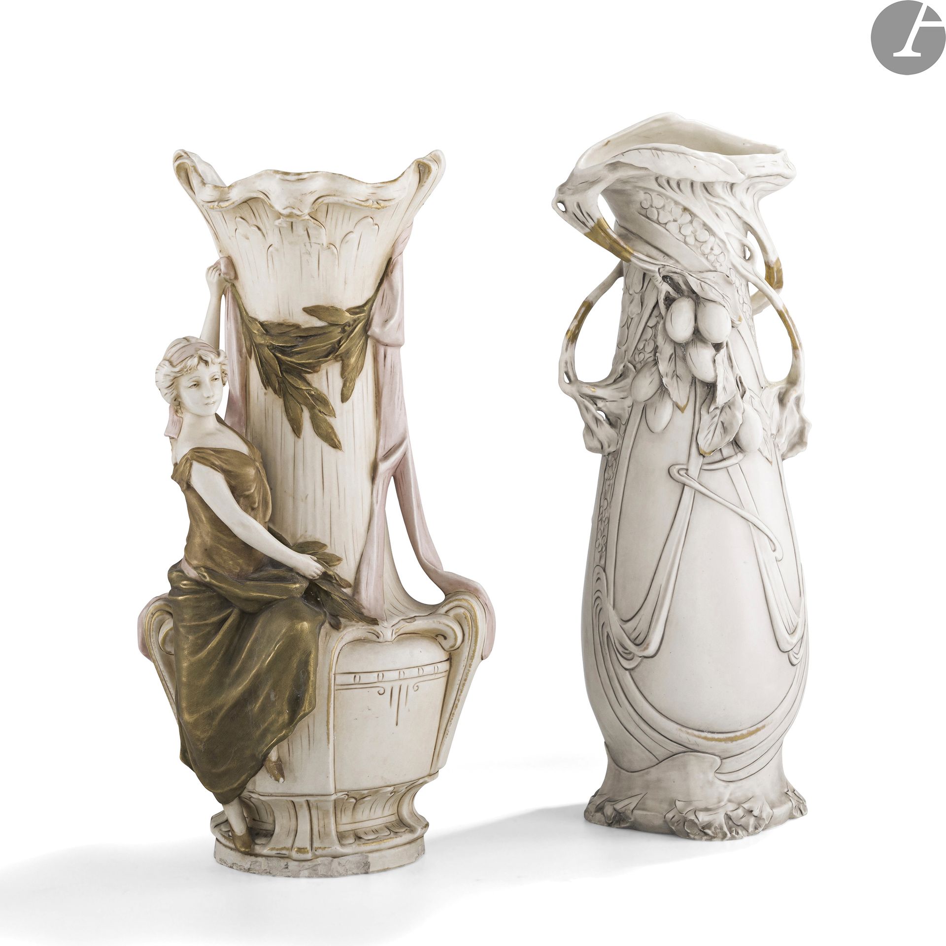 ROYAL DUX BOHEMIA - 2 WORKS-
Woman sitting on a large garden vaseVase
with decoration in relief and in the round. Proof in glazed ceramic; the polychrome and gold parts treated as patinas. Accidents and lacks to the right ballerina and around the heel. Marked with the triangular stamp without mention under the base. H. 44 cm-
Branch of plum tree in fruitsVase
with decoration in relief and in the round

.

Glazed ceramic proof; the polychrome and gold parts treated as patinas. Wear to the gilding. Marked with the triangular stamp ROYAL DUX BOHEMIA under the base. H. 48 cm



