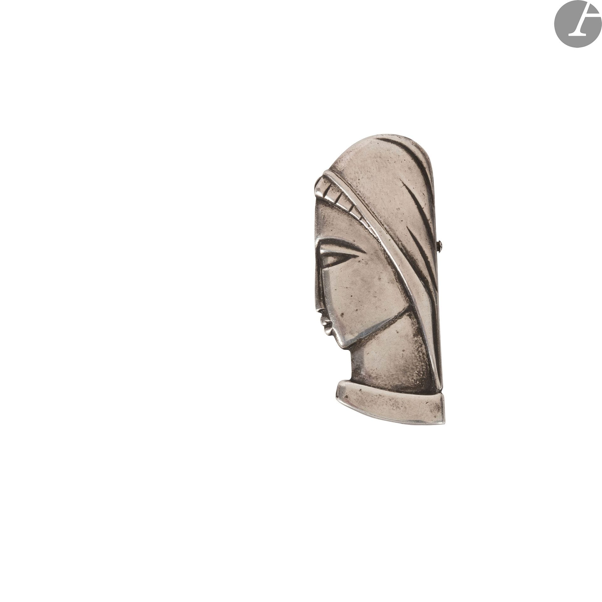 BÉLA VÖRÖS (1899-1983) (ATTRIBUÉ À)
Profil de femme
Broche plaque. Épreuve en argent. Vers 1930. 7,8 x 3 cm