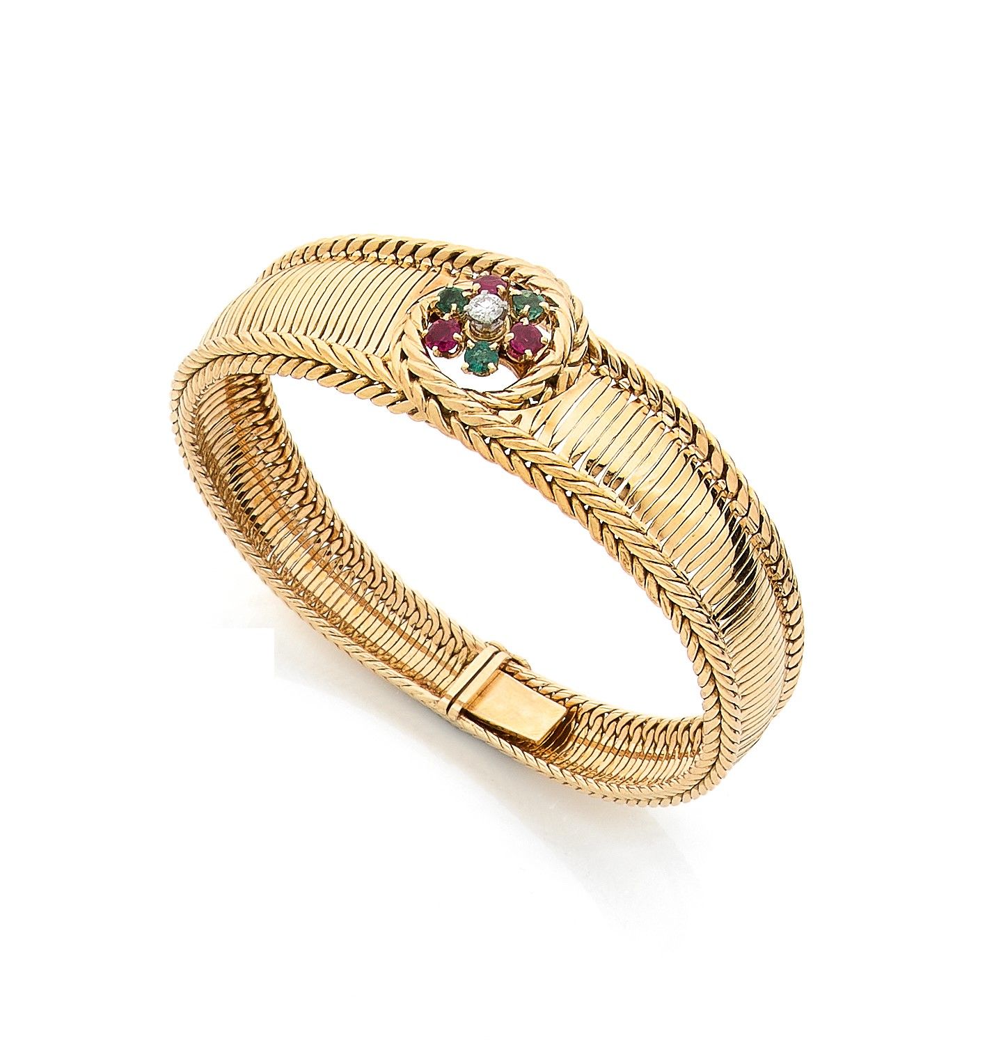 18K (750) gold braided bracelet set with a round brilliant-cut diamond surrounded by alternating emeralds and round rubies. French work of the 1960s. Length : 18,5 cm approximately. Gross weight: 42.1 g (chips)

A 1960 French bracelet set with diamonds and emeralds