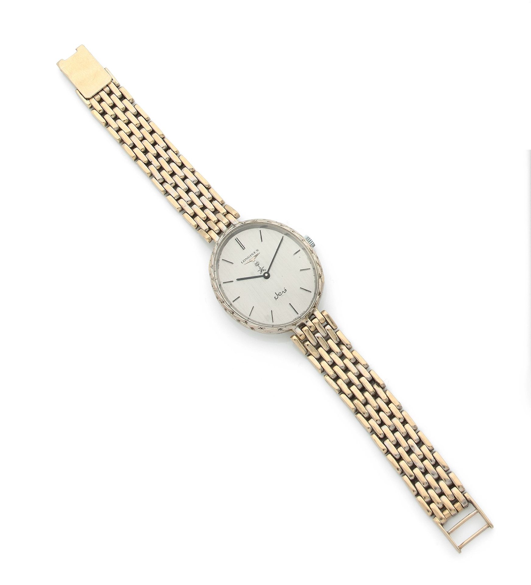 LONGINES. Circa 1970No.

338538Women's 18K (750) white gold wristwatch, gray dial, applied baton numeral hour markers, quartz movement (changed and not working), integrated 18K white gold bracelet, unsigned.
Dial, case and movement signed.
Length: 16.5
cmGross
weight
: 67.7 g




