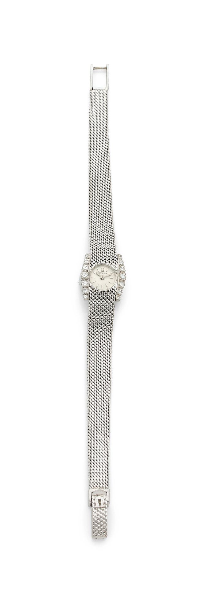 OMEGA. Circa
196018K (750) white gold ladies' wristwatch, bezel set with brilliant-cut diamonds, white dial, applied baton hour markers, mechanical movement, integrated bracelet with signed buckle.
Dial, case and movement signed.
Length: 17.5
cmGross
weight
: 27.7 g



