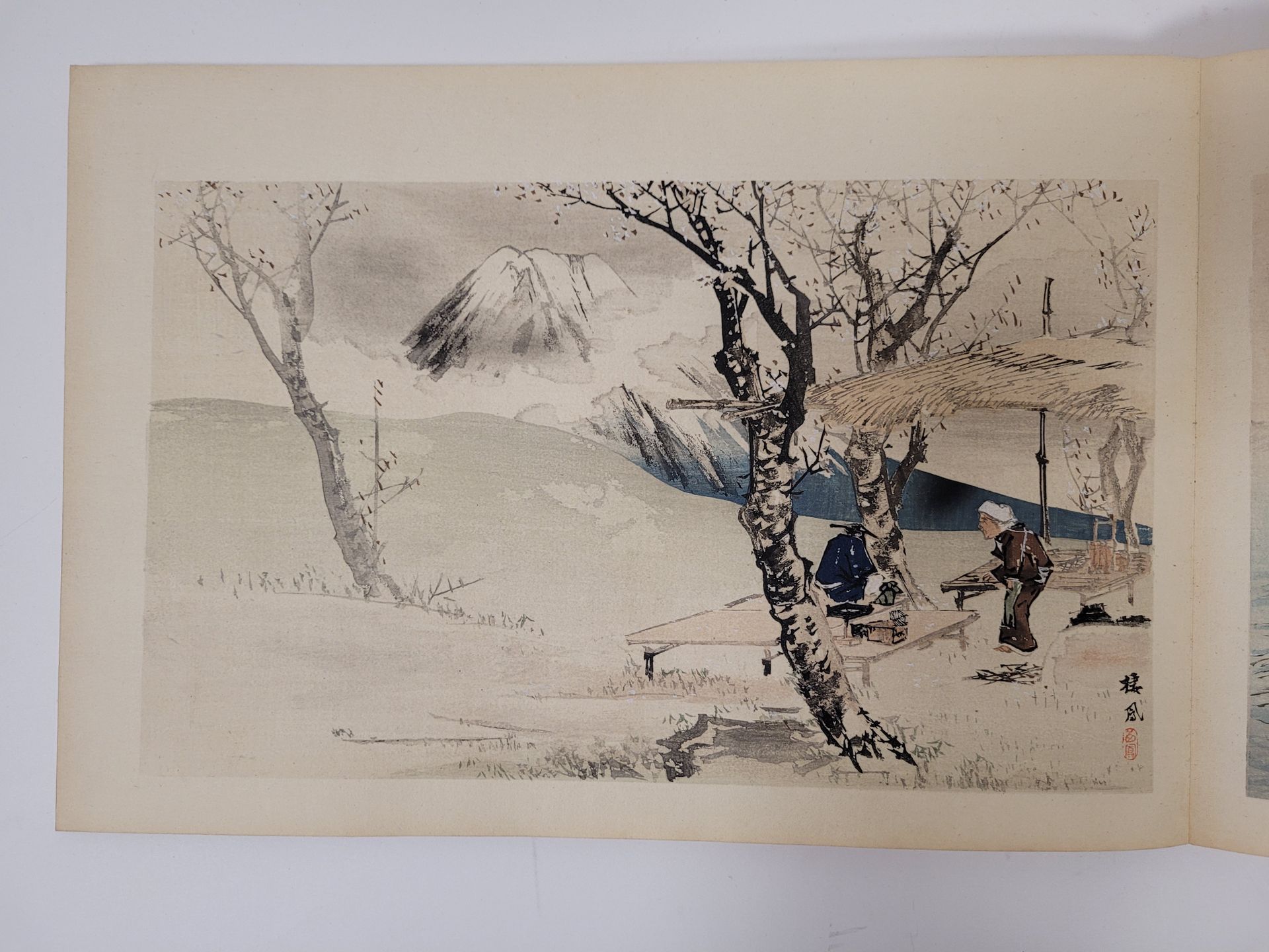 Takeuchi Seiho (1864-1942), Japan, 1894 (published in Kyoto during the 27th year of the Meiji era
)Print album, ink and polychrome on paper : Twelve views of Mount Fuji, Seiho Juni Fuji. Illustrating various rural or interior scenes with Mount Fuji in the background or sometimes some scenes at the foot of the Mount itself. Handwritten title on the cover made of woven plant fibers.
Editor : Tanaka Jihei (Bunido seal), Yamada Naosaburo (Unsodo seal).
Engraver : Tanaka Jirokichi.
Printer : Yamazaki Yasutaro.
22,70 x 33,1 cm




