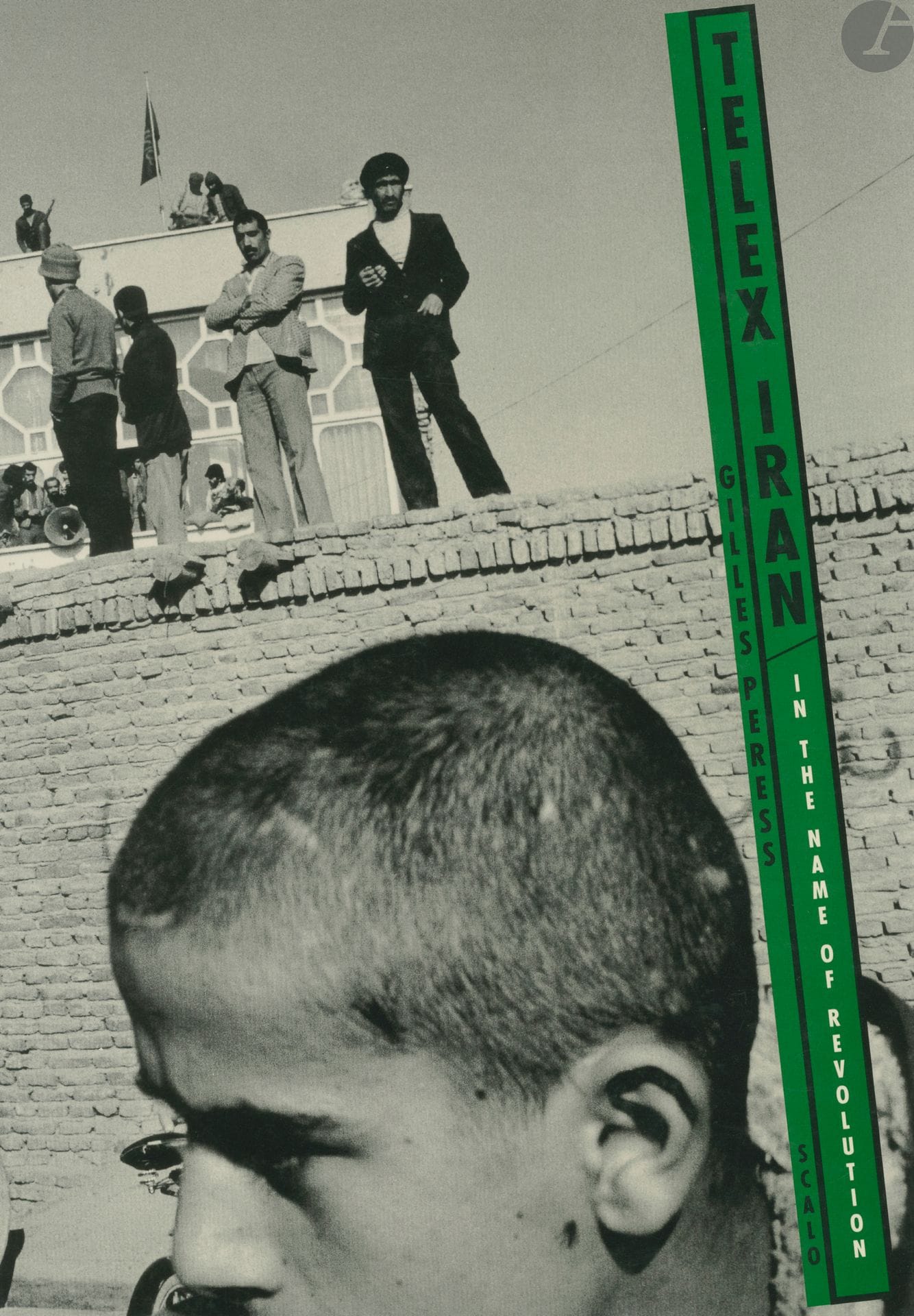 PERESS, GILLES (1946)
Telex Iran. In the name of Revolution.
Scalo, 1997.
In-folio (38 x 27 cm). Deuxième édition. 102 pages. Cartonnage illustré d'éditeur.