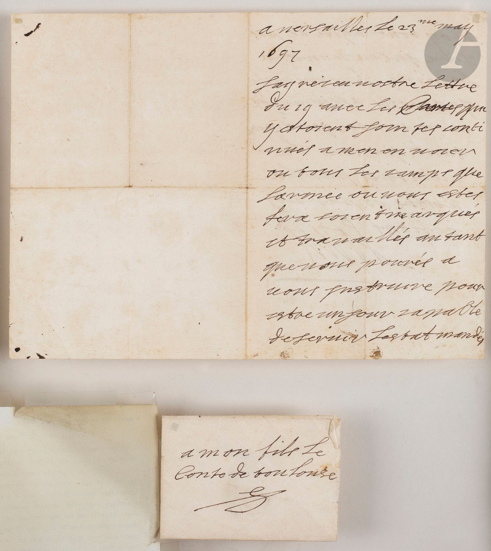 LOUIS XIV (1638-1715). L.A.S., Versailles 23 mai 1697, à son fils le comte de Toulouse ; 2 pages petit in-4, enveloppe autographe « a mon fils le conte de Toulouse » avec sceau de cire rouge aux armes (encadrée).

   Belle lettre du Roi à son fils pendant la guerre de neuf ans. [Louis-Alexandre de Bourbon, comte de Toulouse et duc de Penthièvre (1678-1737), dernier fils légitimé de Louis XIV, nommé amiral de France à cinq ans.]
   « Jay receu vostre lettre du 19 avec les Cartes qui y estoient jointes continués a men envoier ou tous les camps que larmée ou vous estes soient marqués et travaillés autant que vous pouvés a nous instruire pour estre un jour capable de servir lestat. Mandés moy tout ce qui se passera qui en vaudra la peine. Il ne me reste qua vous assurer de mon amitié qui durera tant que vous la meriterés par la vostre et par vos actions »… 
   [Le 3 août 1697, le comte de Toulouse sera nommé lieutenant général des armées du Roi.]

