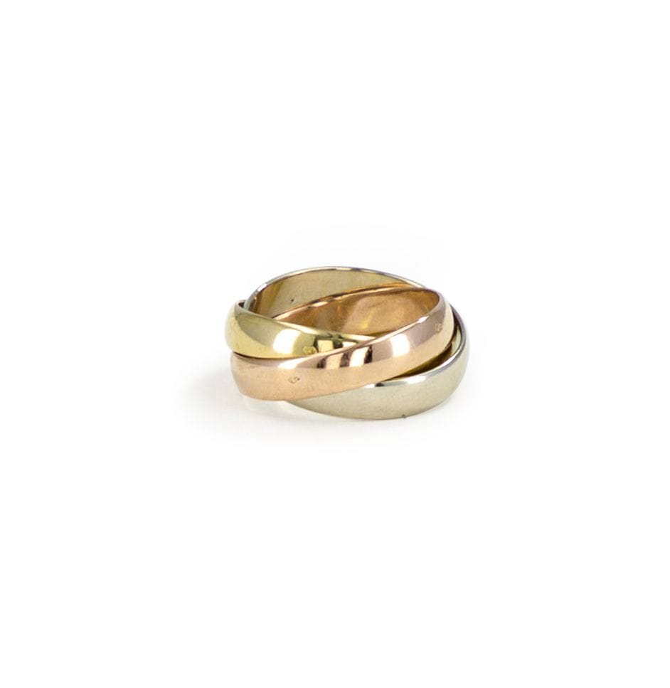 Bague 3 anneaux en 3 tons d'or en or 18K (750). Tour de doigt : 47. Poids : 7 g (altérations suite à incendie)