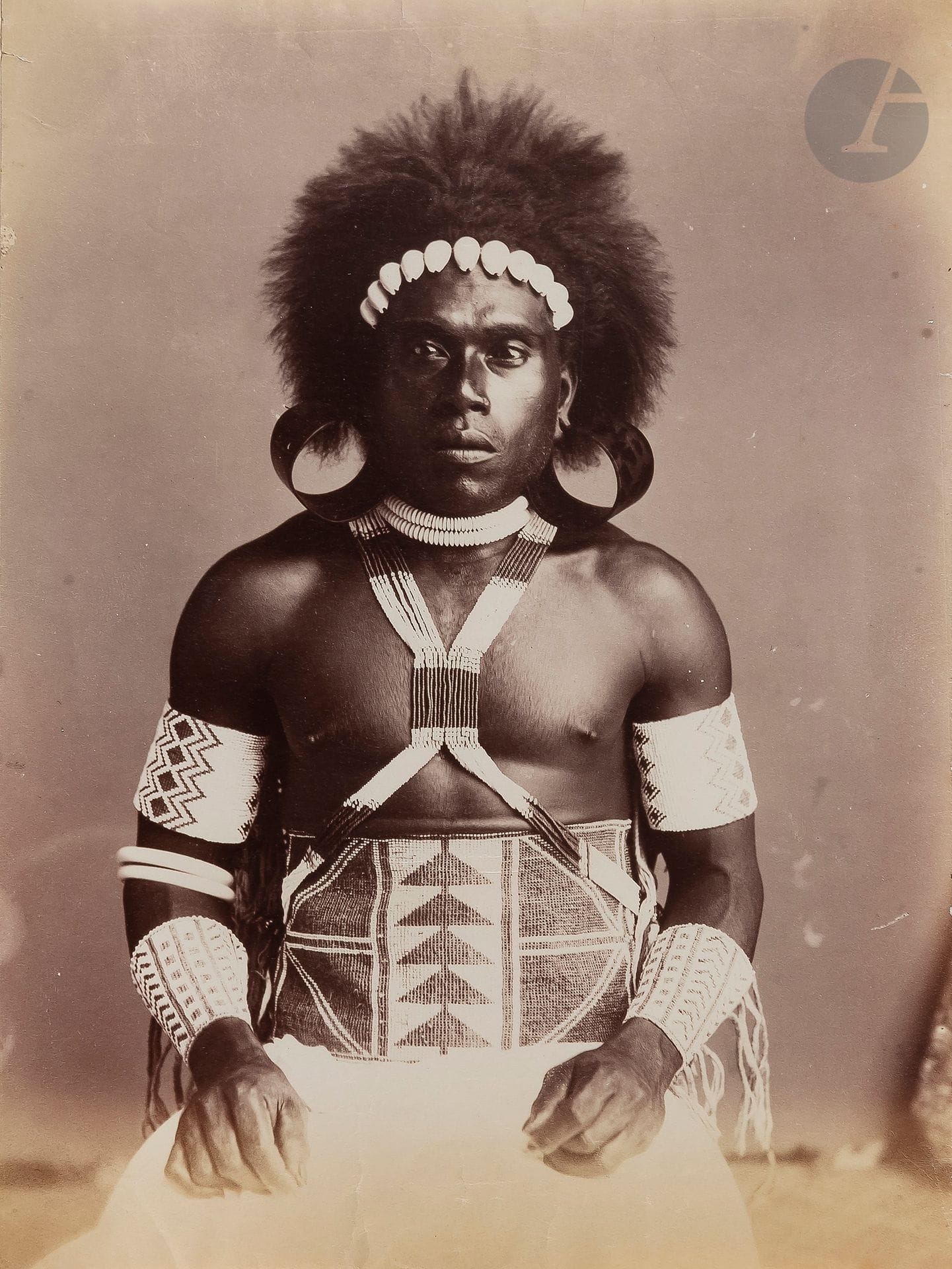 Burton Brothers (attributed to
) Fiji. Stewart Islands. Solomon Islands. Samoa, 
c. 1880.
Navua River. Young Fijian women. Rewa River. Traditional architecture. Pirogue. Warrior. Village.  Samoan woman. Young men wearing traditional clothes and accessories. 
Album in-folio (31,5 x 27 cm) composed of 27 albumen prints, most of them laminated on cardboard and inserted by the corners in the leaves. Some handwritten annotations on the mounts.
Average size of the prints : 19,5 x 14,5 cm




