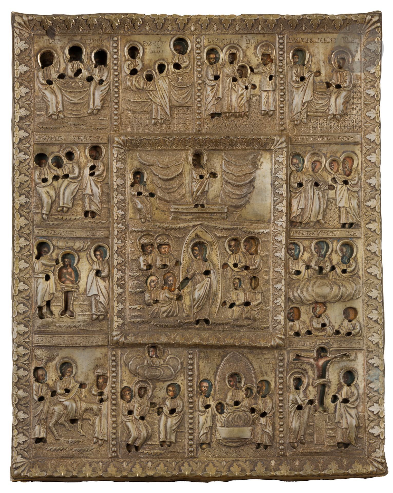 Icône des 12 fêtes principales. Fin du XVIIIe siècle. 
Autour de l’icône de la descente aux Enfers et de la Résurrection, douze vignettes avec de gauche à droite et de haut en bas : la Sainte Trinité, la Nativité de La Vierge, la Présentation de la Vierge au Temple, l’Annonciation, la Nativité du Christ, la Circoncision, le Baptême du Christ, la Transfiguration, l’Entrée à Jérusalem, l’Ascension, la Dormition de la Vierge et la Crucifixion. 
Oklad en vermeil repoussé et gravé. 
Poinçons : 84, Moscou, 1788, essayeur « А•В » (Alexeï Ivanov Vikhliaev) et orfèvre « I•Г » (Ivan Grigoriev). 
32 x 26 cm ; poids brut : 1706 g

[art russe]