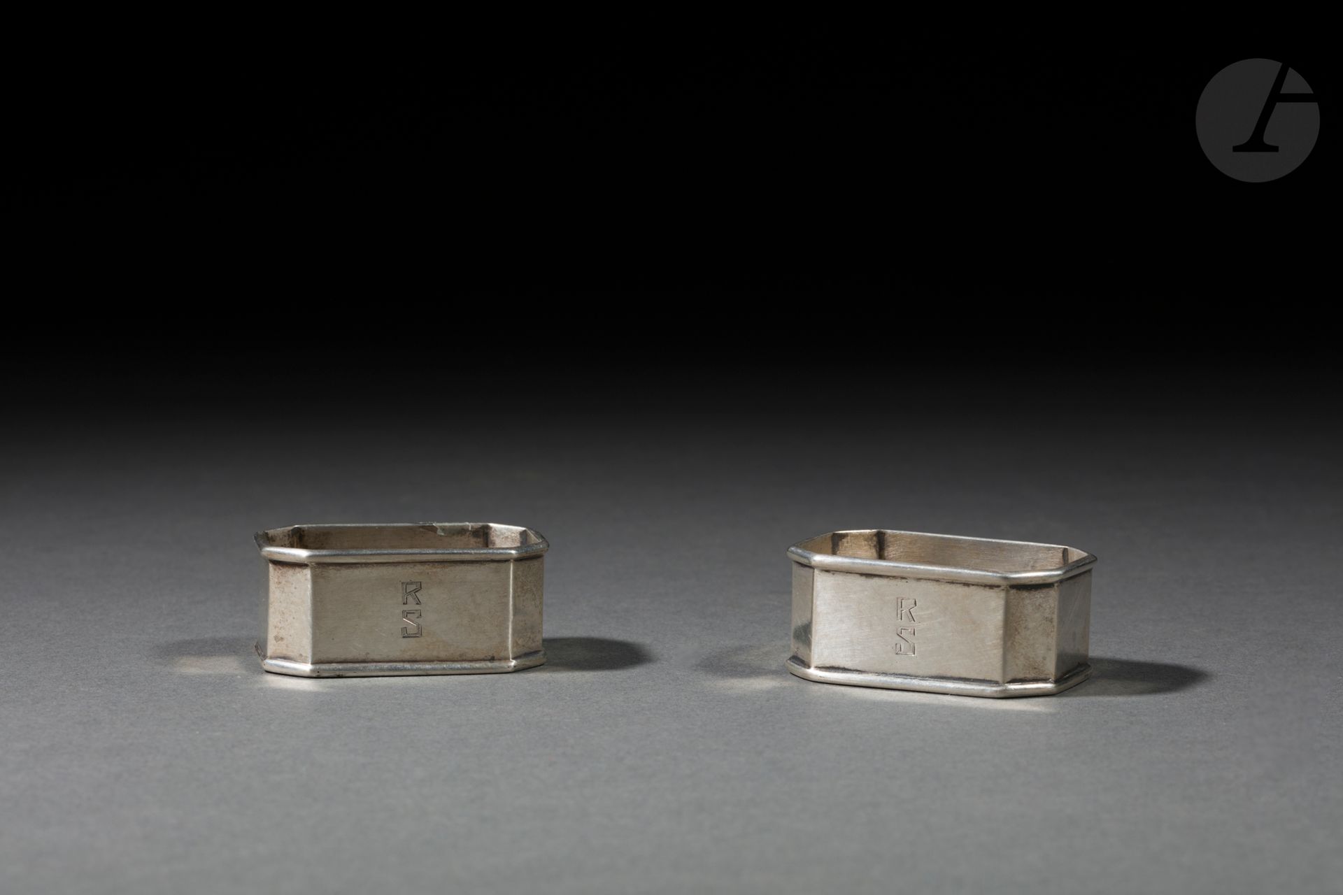 Pair of silver saltcellars. Saint Petersburg, early 20th century. 
Rectangular salt cellars with cut sides. Monogrammed " R S " in Latin letters. 
Hallmarks: 84; St. Petersburg 1899-1908, mark "М. ОВЧИННИКОВЪ" (Mikhail Pavlovich Ovchinnikov) and silversmith "МН" (or "HW"?). 
5 x 3.5 x 2 cm; weight: 111 g

[Russian art]