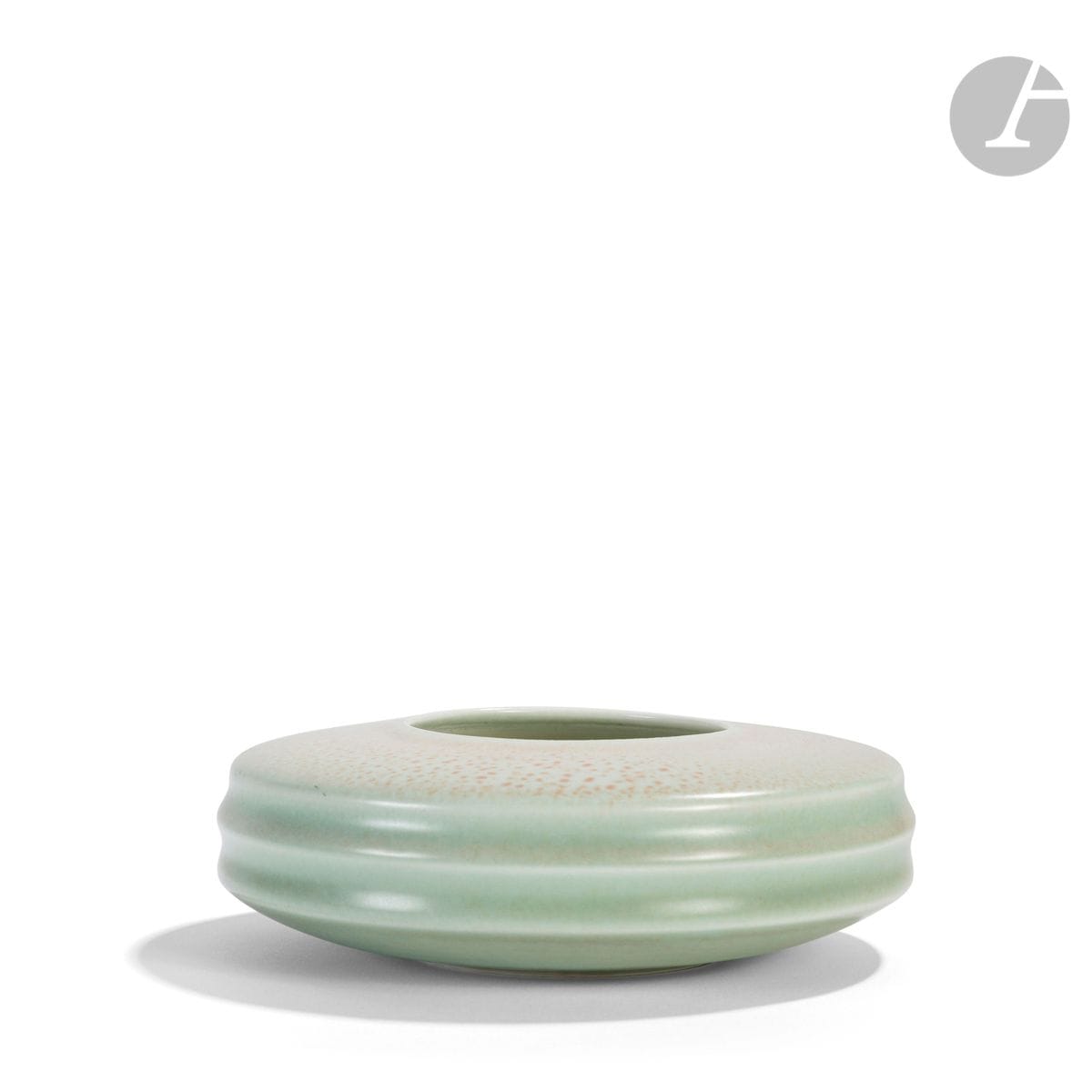 JEAN GIREL (BORN IN 1947)
Toric vase.
Proof in celadon green enamelled porcelain.
Around 2000.
Signed Jean GIREL under the base.
Height : 5,5 cm - Diameter : 18 cm

Provenance :
Private collection, Paris.