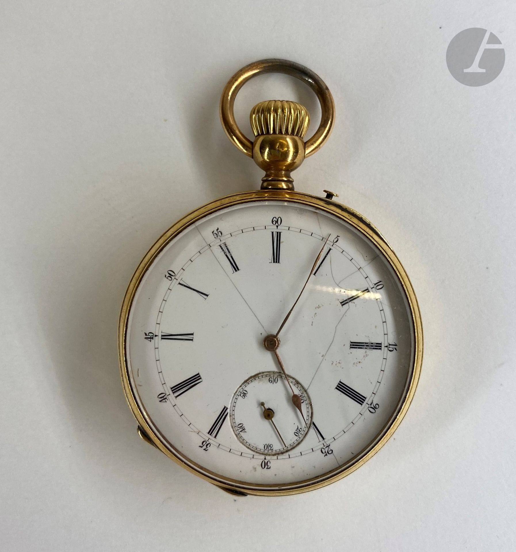 Montre chronographe en or (18K). Poids brut : 92,3 g Mouvement B Haas à Genève. Fond gravé monogrammée TA. (Accidents) Double paroie. Cadran émaillé, chiffres romains formant les gheures.