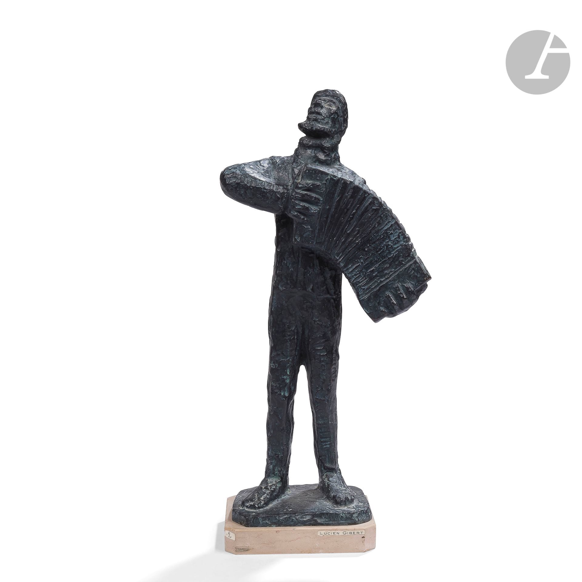 LUCIEN GIBERT (1904-1988)
Chanteur de rue, le modèle créé en [1954]
Sculpture. Épreuve en bronze à patine noire. Base en marbre beige. Signée GIBERT sur la terrasse et porte le cachet SUSSE fondr Paris à l’arrière sur la tranche de la terrasse. H. avec base : 52 cm – H. bronze seul : 49 cm

Bibliographie :
Mobilier et Décoration – N° 2 de mars 1958. Un modèle identique (dans un autre matériau) reproduit page 31.