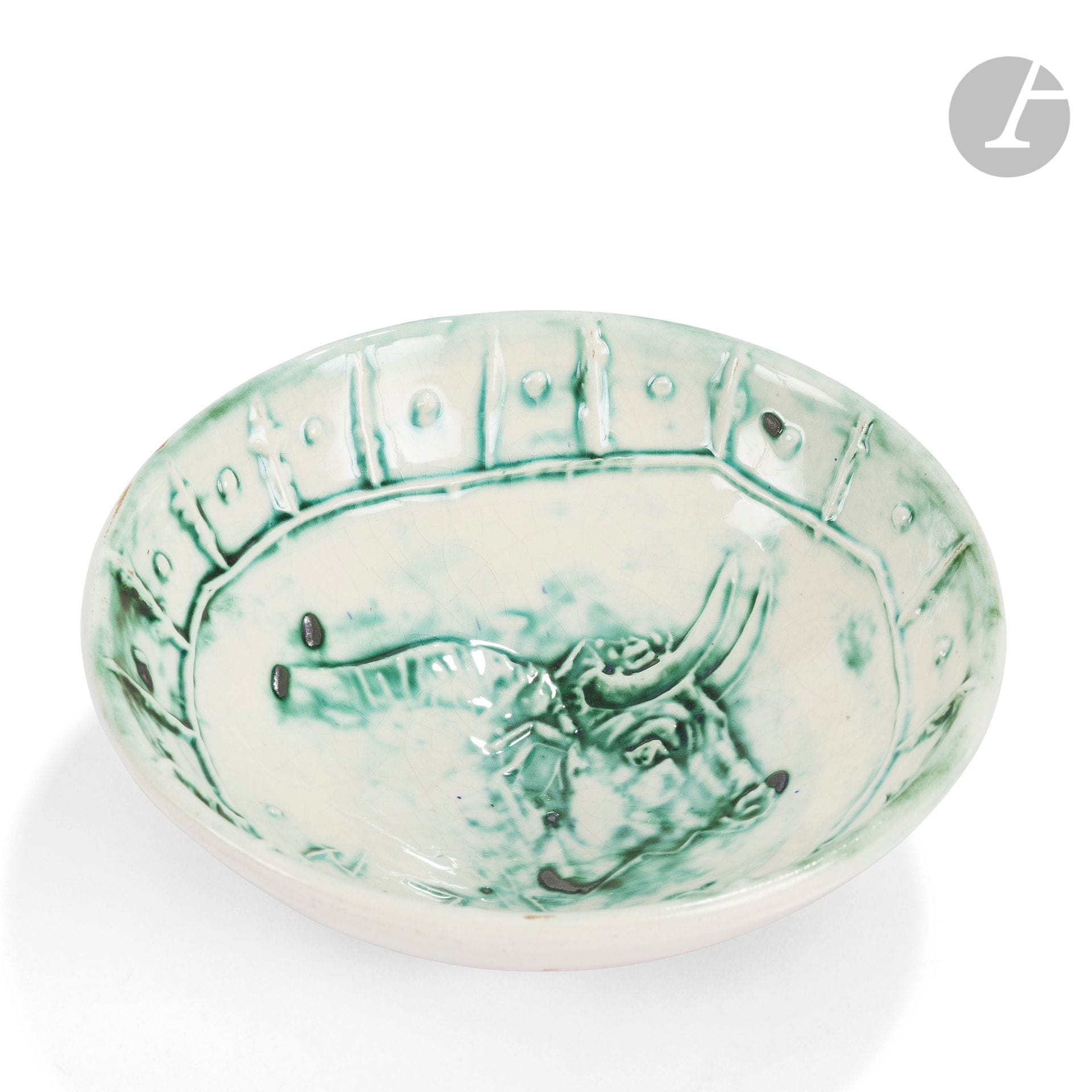 PABLO PICASSO (1881-1973) & ATELIER MADOURA
bull's
head
, model created in [1954]
Round cup. Original proof, edited to one hundred copies made at Madoura. Proof in white earthenware, underglaze slip decoration, green, white, pink patina. Bears the stamps MADOURA Plein feu - Original print of PICASSO under the base. D. 17,8 cmBibliography

:
Picasso, catalog of the ceramic work published 1947-1971 - Alain Ramié, Madoura editions, 1988


.


Identical model reproduced on page 125 under the number 232 of the catalog.




