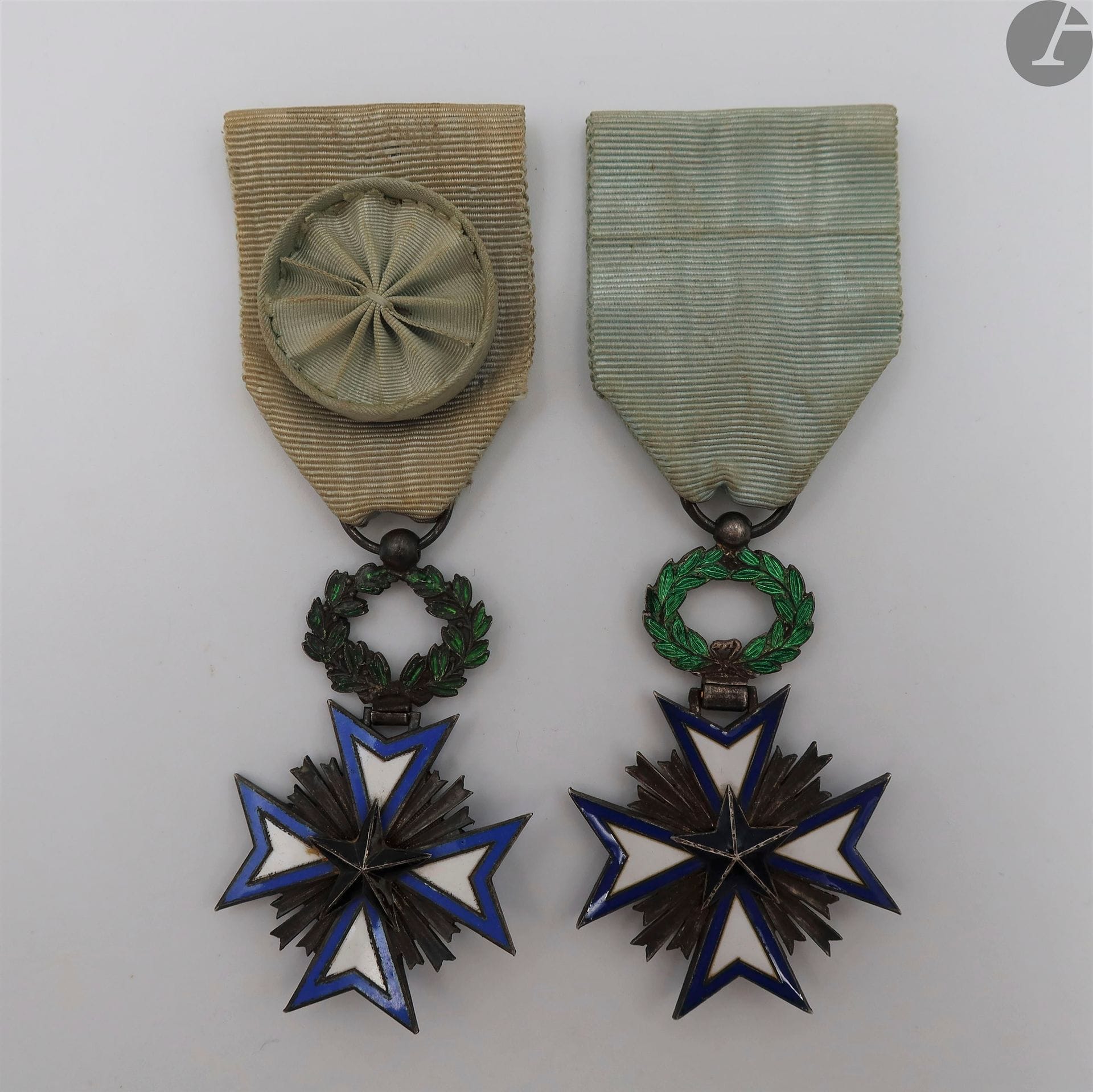 BENIN 
ORDER OF THE BLACK STAR, created in 1889. 
Two knight stars and a patent. 
Silver and enamel. One with knight's ribbon with attachment hook and one with officer's ribbon. 
Boar's head hallmarks. 
59 x 42 mm - Gross weight: 20 g approximatelyBrevet
knight of the black star of Benin, in the name of Henri Bourguignon (S.N.R. of Kati). Made in Paris on May 10, 1954.
T.T.B






.