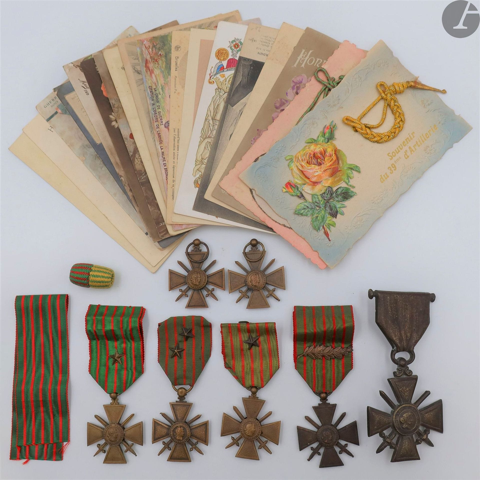FRANCE 
WAR CROSS - 1st World War.
Set including :
- six bronze war crosses (four 14-18, one 14-17, one 14-15).
Two without ribbon.
- set of nineteen postcards on the war cross and the city of Verdun, a fourragère olive, a bronze war cross of monument, a ribbon cut.
- beautiful citation to the order of the regiment of private Durand of the 85th infantry regiment. Made on June 3, 1919. Framed under glass.
- citation to the order of the regiment for Louis Millet of the 287th R.A.L. Framed under glass.
T.B. to SUP.







