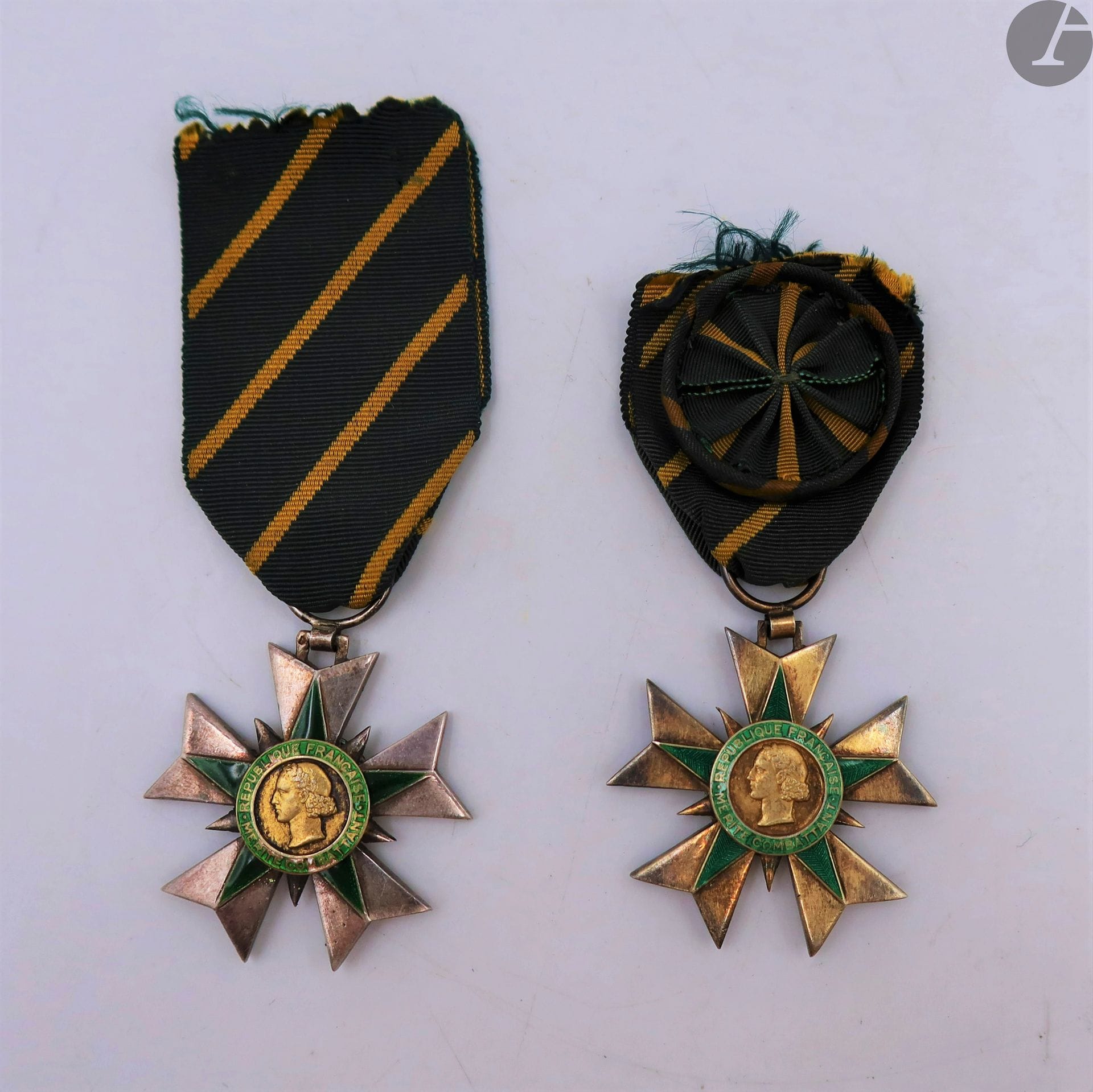 FRANCE 
ORDRE DU MÉRITE COMBATTANT, created in 195Two
decorations : 
- Officer's star in vermeil and enamel. Ribbon with rosette. Boar's head and goldsmith's stamp "V.T". 
40 mm - Gross weight : 16,7 gT
.T.B. to SUP.
- knight's star in silver, vermeil and enamel (small chips, center to be reattached). Ribbon. Boar's head hallmark. 
40 mm - Gross weight : 18 gT
.B to T.T.B







