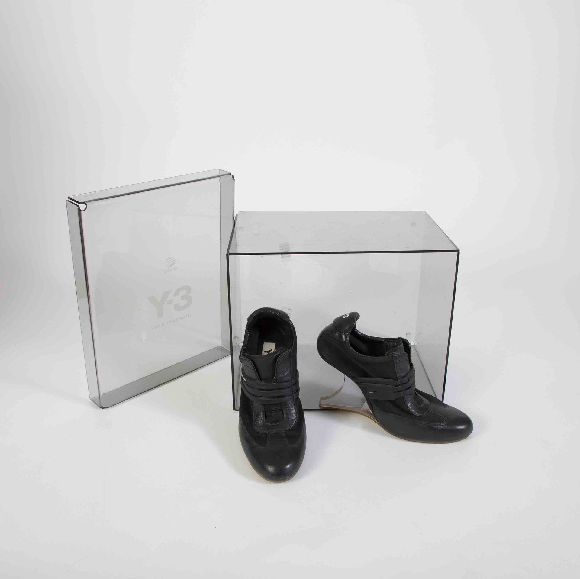 Y-3 Yohji YAMAMOTO for AdidasPair of
black leather and nylon wedge sneakers, plexiglass heel, S.37 1/3, covers and in its box
(small traces of use)

