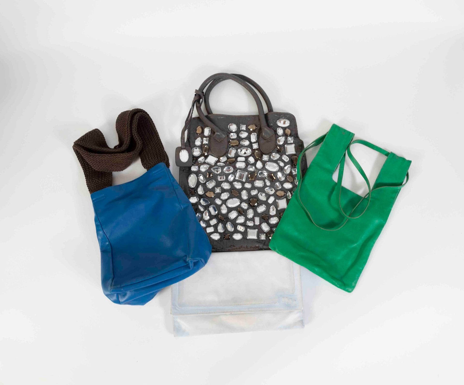 Lot de quatre sacs en cuir dont un Margiela (en l’état)