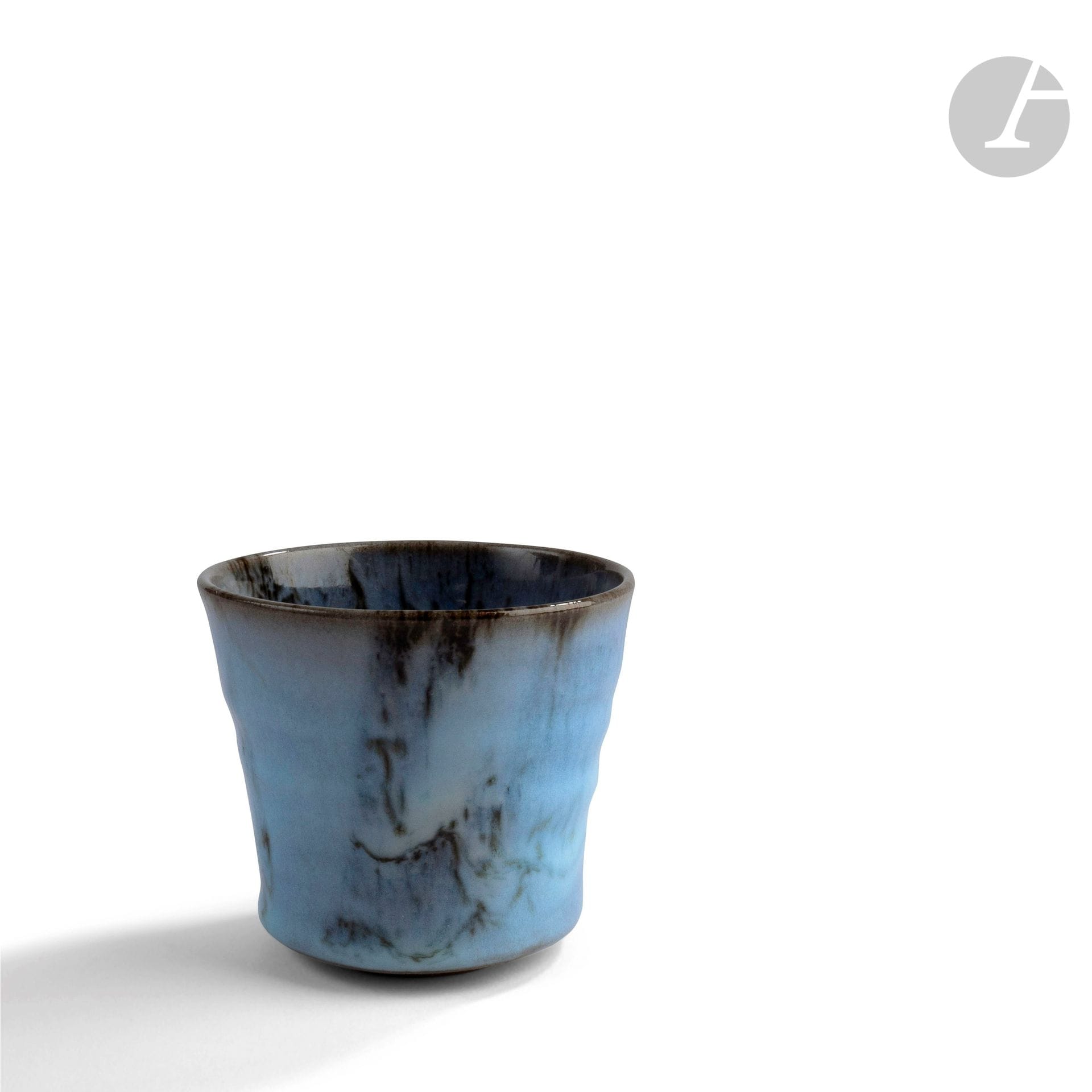 Marc UZAN (France, born in 1955
)Blue enamelled ceramic bowl with interior decoration of spiral. Signed under the base. H. 9 cm - D. 9 cm
