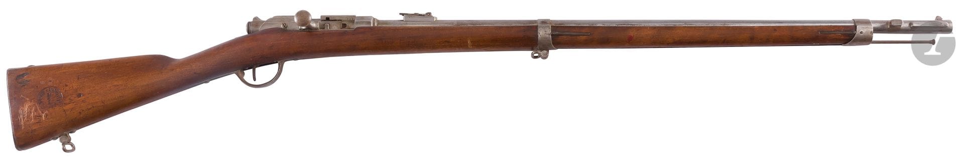 Fusil Gras des bataillons scolaires pour la manœuvre. 
Canon rond avec hausse, bouché. Verrou frappé « ANDREUX Bte PARIS ». Garnitures en fer. Crosse en noyer avec marquages « 16e Bon SCOLAIRE PARIS 237 ». Baguette en fer. 
Longueur totale : 112 cm
A.B.E.