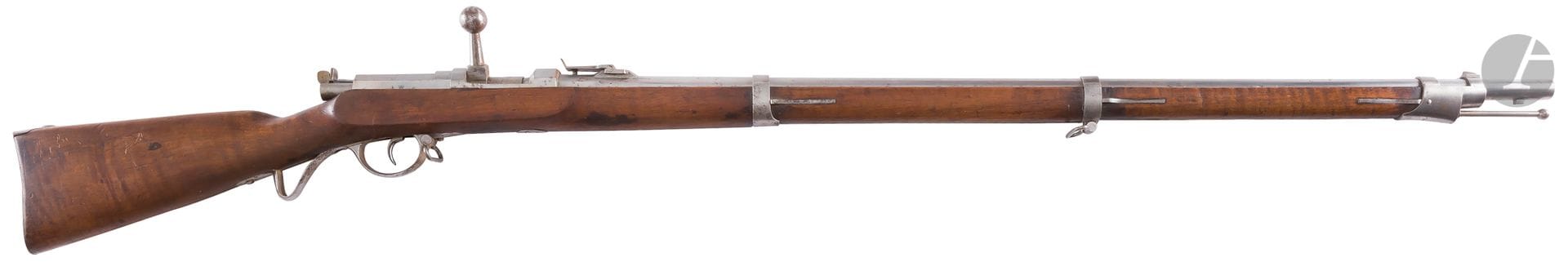 Dreyse Wurtembergeois rifle 1857 / 67 caliber 15 mm approx. 
Round barrel, with thunderbolt, with rise, stamped 2 under crown. Breechblock stamped "K&C". Punched iron fittings (missing a screw at the trigger guard). Stick in drowning marked W under crown. Iron ramrod. 
Return of plate of layer punched " 7-4-155 " (7th regiment Wurtembergeois)
Length of the barrel: 82 cm - Overall length: 142 cmA
.B.E.



