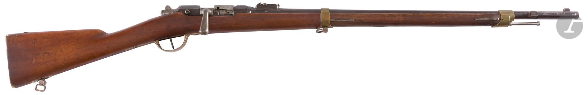 Gendarmerie rifle model 1866-74 M80, caliber 11
mmRound
barrel
, with thunderbolt, with rise to 10, punched "S 1877". Breechblock marked "MANUFACTURE NATIONALE St Etienne Mle 1866-74 M80". 
Brass fittings, some stamped. 
Stick in drowning. Iron ramrod. 
Several serial numbers.
Bronzed finish 
Length of the barrel: 68 cm - Overall length: 117 cm
.






