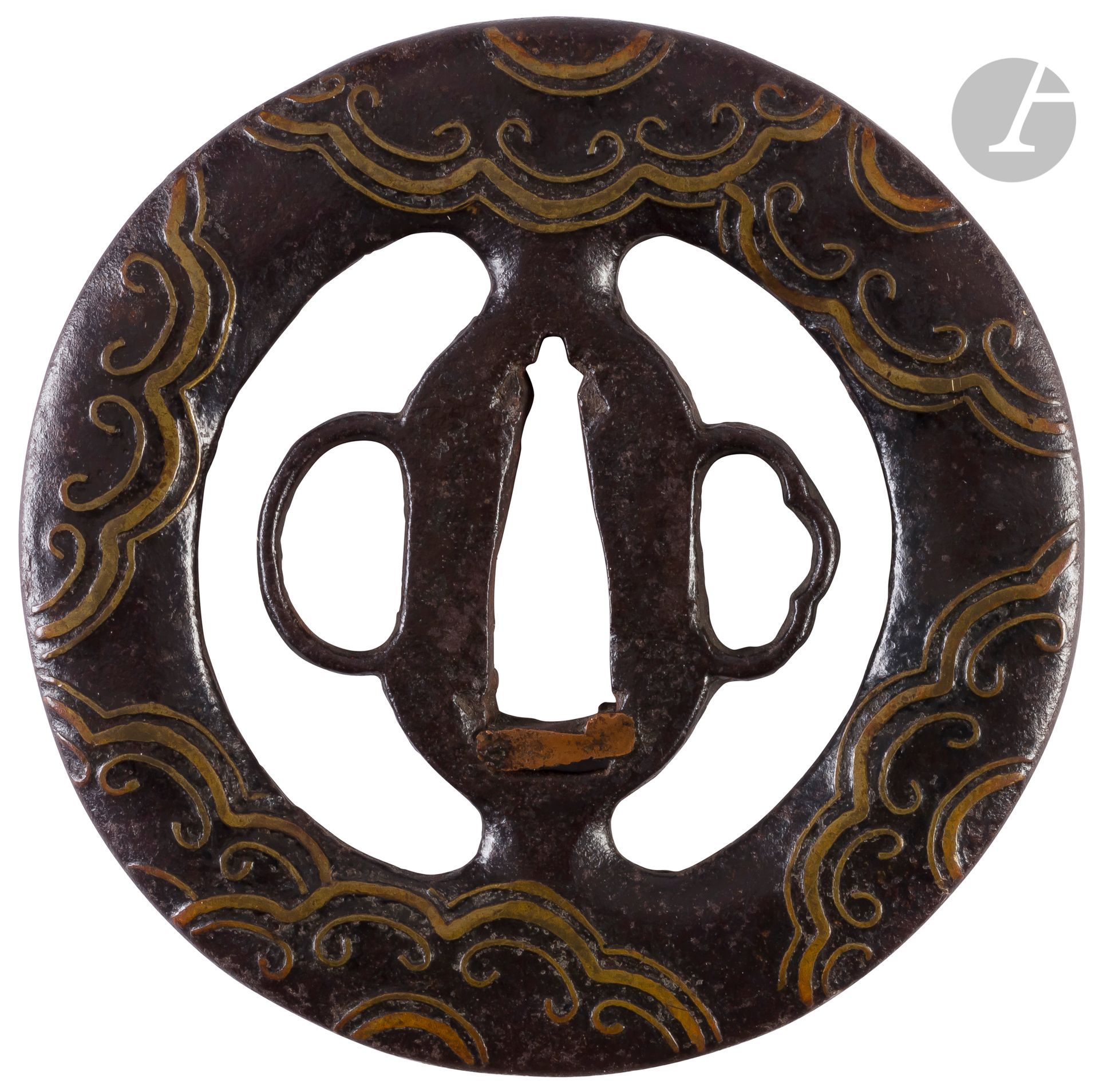 Iron tsuba in the Heianjo style, Japan, 16th - 17th century
Of maru gata form with large namako motifs and inlaid with stylized sentoku clouds. Not signed.
8,3 cm

Provenance :
Former Grataloup collection.


