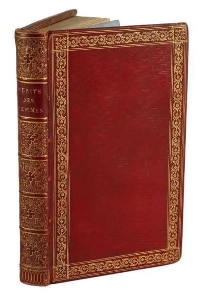 LEGOUVÉ (Gabriel)
Le Mérite des femmes, et autres poésies. Paris: Ant. Aug. Renouard, 1809. - In-12, front., 252 pp., 3 pl. Maroquin rouge à long grain, cadre formé d'une roulette de volutes florales encadrée de deux doubles filets dorés et coupée aux angles d'un fleuron de feuillages doré dans un compartiment carré, dos à faux nerfs orné dans les caissons d'un décor à mille points autour d'un quadrilobe, roulette à la grecque à l'intérieur, doublures et gardes de soie moirée bleue, tranches dorées (F. Bozérian jeune). Dernière édition publiée du vivant de l'auteur et troisième édition donnée par Antoine Auguste Renouard après celles de 1803 et de 1804. Elle est illustrée de trois planches gravées sur cuivre d'après Moreau le jeune et Guérin, dont une en frontispice, et d'une planche gravée sur bois. BEL EXEMPLAIRE SUR PAPIER VÉLIN, RELIÉ PAR FRANÇOIS BOZÉRIAN. Légers frottements aux coiffes et aux charnières. Une griffure sur le second plat