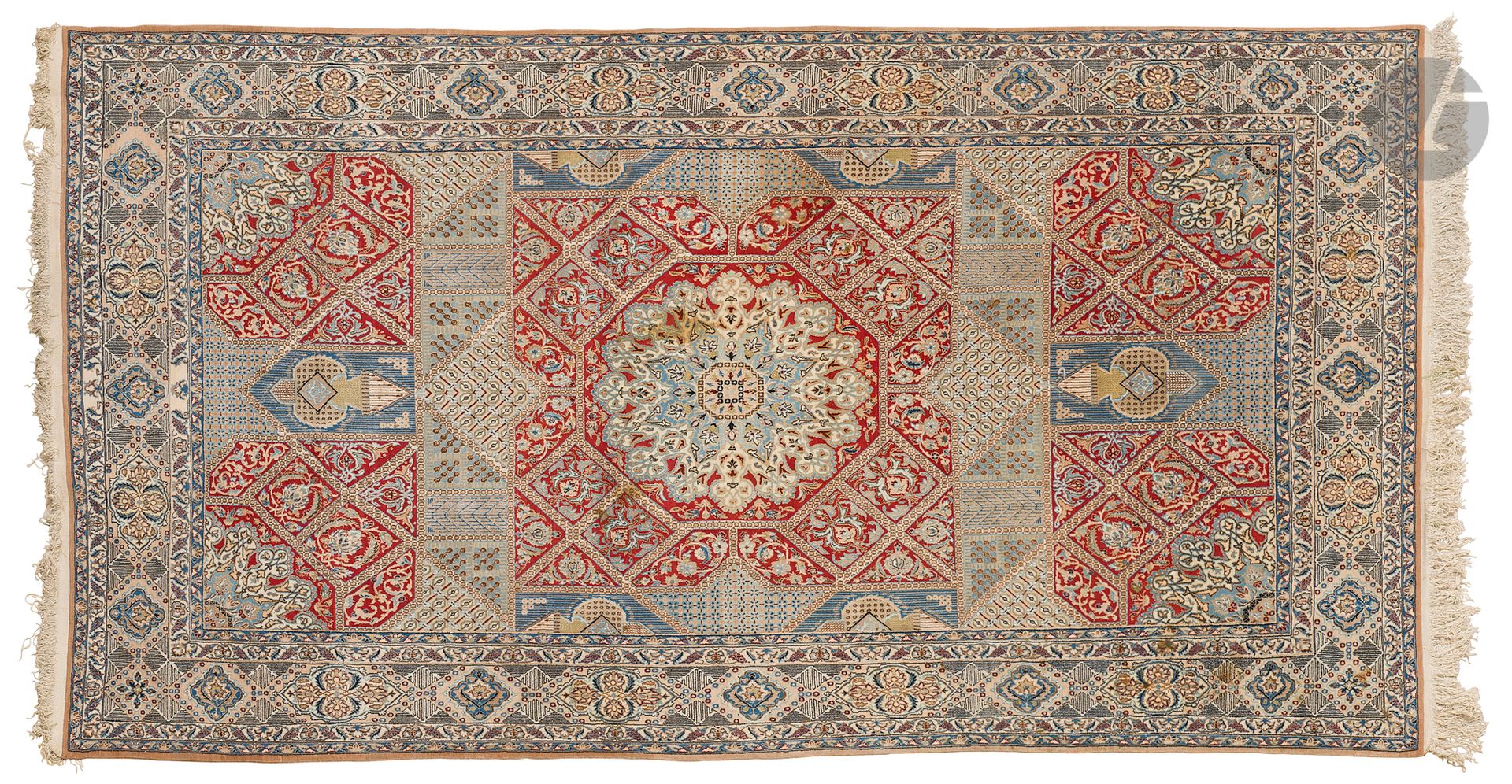 NAIN, XXth century, wool velvet, cotton warps and wefts.
Carpet with central medallion in the form of an octagon on a ruby background, border with repetitive geometric designs.
162 x 293 cm