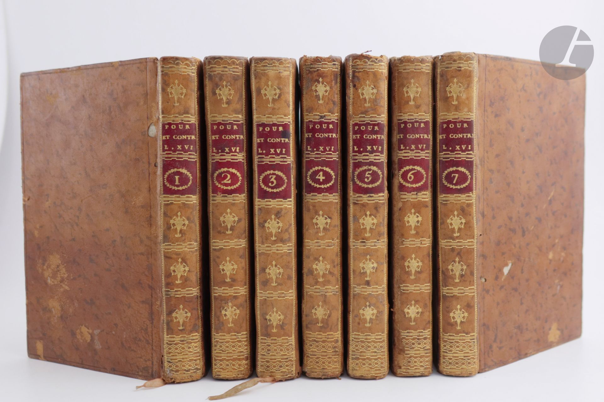 [LOUIS XVI].
Le Pour et le contre: recueil complet des opinions prononcées à l'Assemblée conventionnelle, Dans le Procès de Louis XVI; On y a joint toutes les Pièces authentiques de la Procédure.
Paris: Buisson, Chaudé, year one of the Republic [1793]. - 7 volumes in-8, marbled basane, cold fillet on the boards, smooth spine decorated, marbled edges (period binding).

First edition of this collection of speeches delivered during the trial of Louis XVI. To these speeches are attached various historical pieces such as the enunciative act of Louis Capet's crimes, the interrogation of the king, the speech of his defense, the nominal appeals on the nature of Louis Capet's crimes, on the appeal to the People, on the punishment to be inflicted on Louis Capet, as well as on the stay of execution of his judgment, etc. The collection ends with the decree of death of Louis Capet, the report of the sessions of January 20 and 21, 1793, the report of the execution of the king and his will.

Worm work and spotting to the bindings, snags to the headpieces. Some scattered foxing and browned leaves.