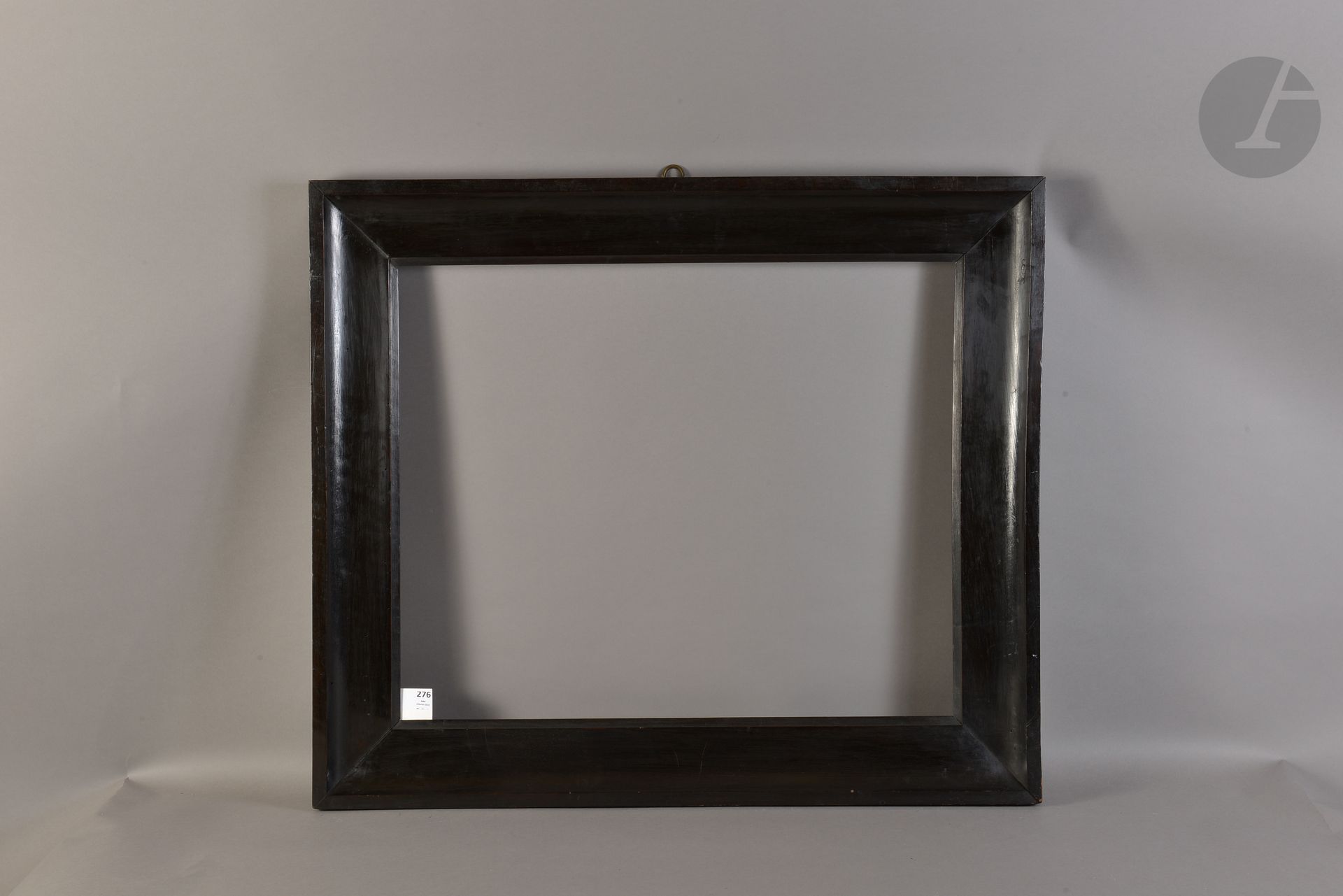 Throat in molded and blackened fruitwood. Italy Beginning of the XIXth century. 54,2 x 66,2 cm - Profile : 10 cm