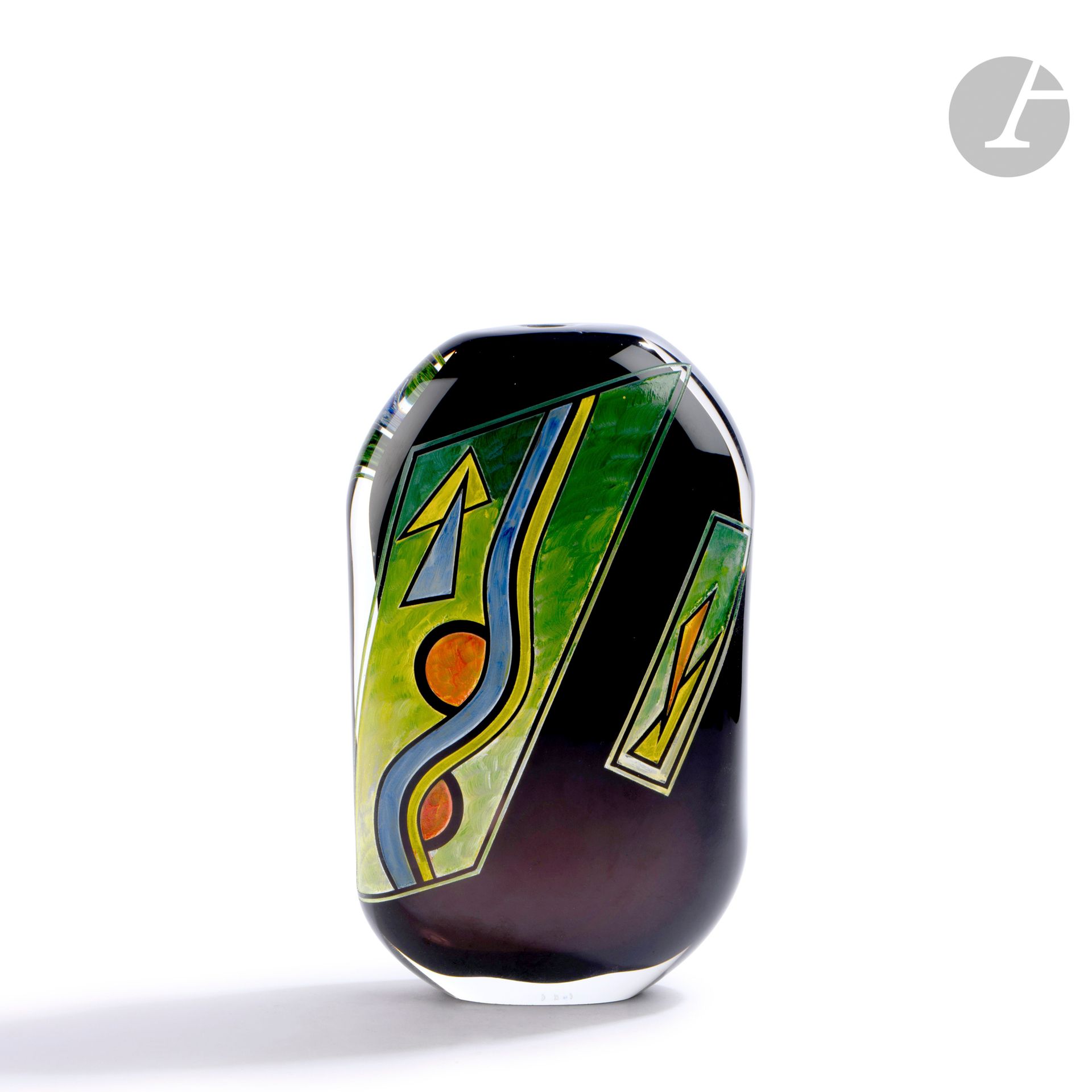 Régis and Gisèle FIEVET (France, born in 1948 and 1951)
Vase in black blown glass, with sandblasted geometrical decoration then partially enamelled with bright colors. Signed, dated 1991 and numbered N60 on the base. H. 28 cm - W. 16 cm - D. 7 cm