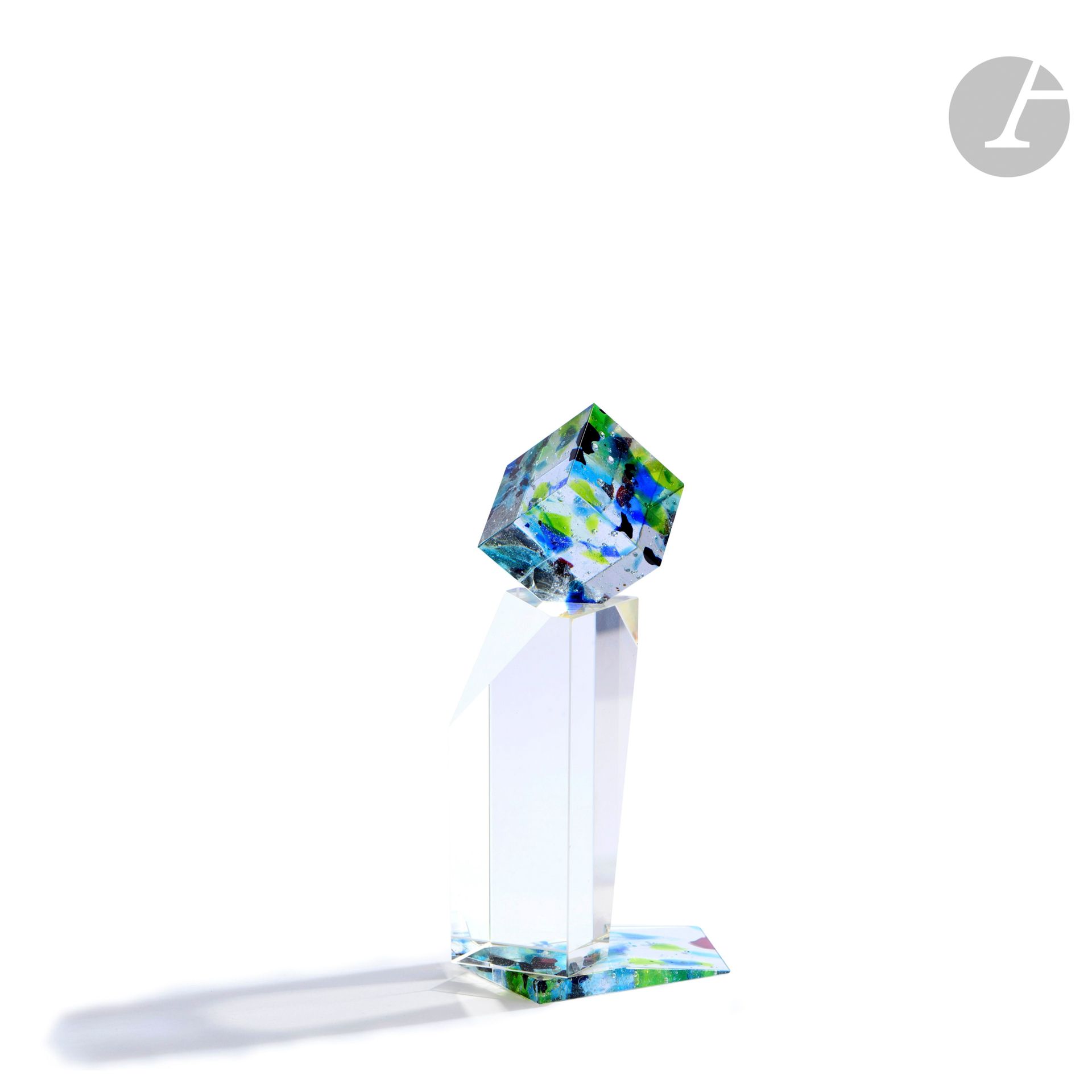 Yvon CHIAMPO (France, born in 1945)
Small optical glass sculpture composed of three assembled elements, two of them with polychrome decoration. H. 16 cm - L. 6 cm - D. 8 cm