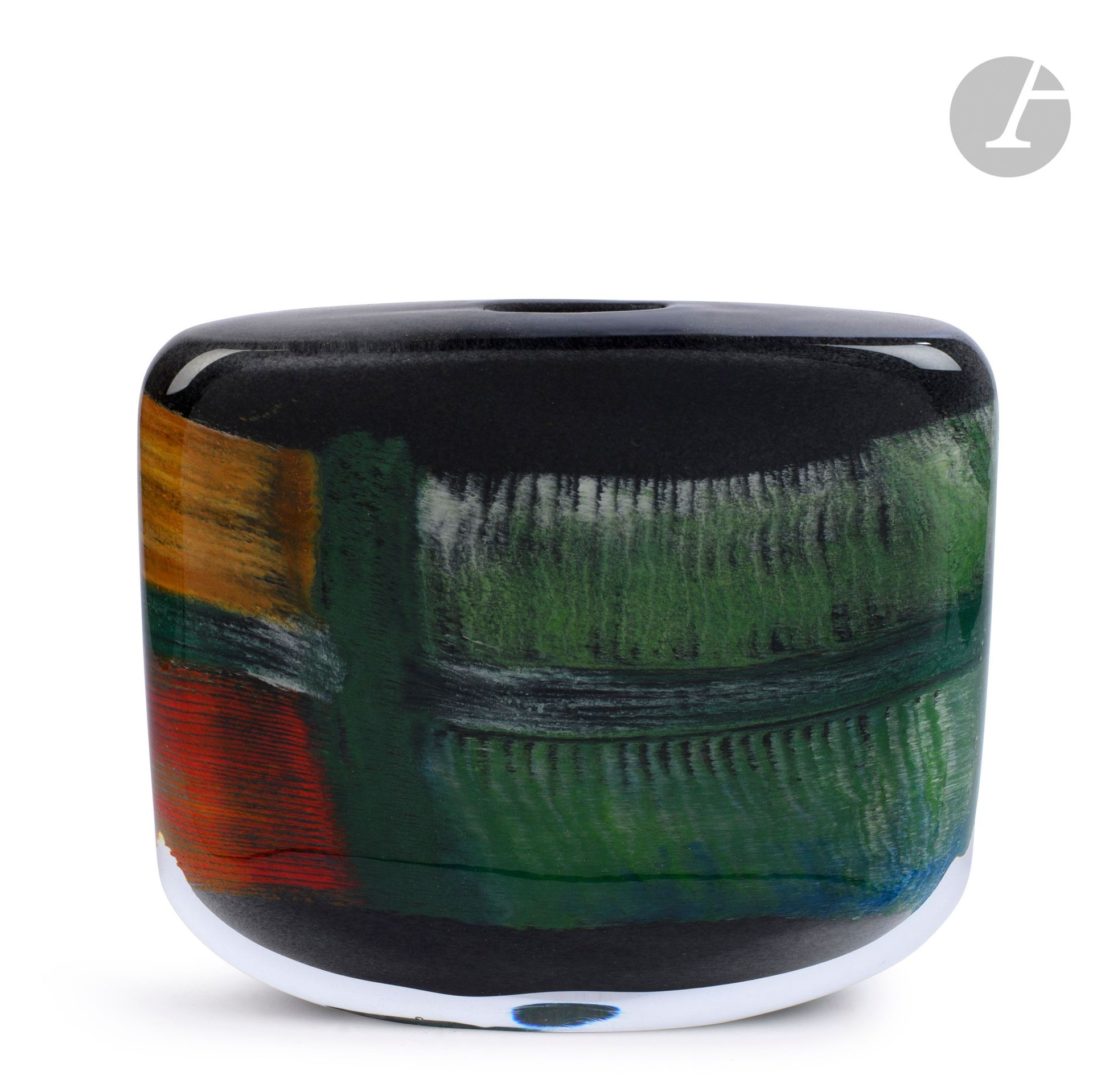 Alain and Marisa BEGOU (France, born in 1945 and 1948)
Blown glass vase of rectangular flattened form with green, yellow and red squared decoration on black bottom. Signed and numbered 5 C 41 on the base. Made in 1995. H. 34 cm - W. 37 cm - D. 7 cm