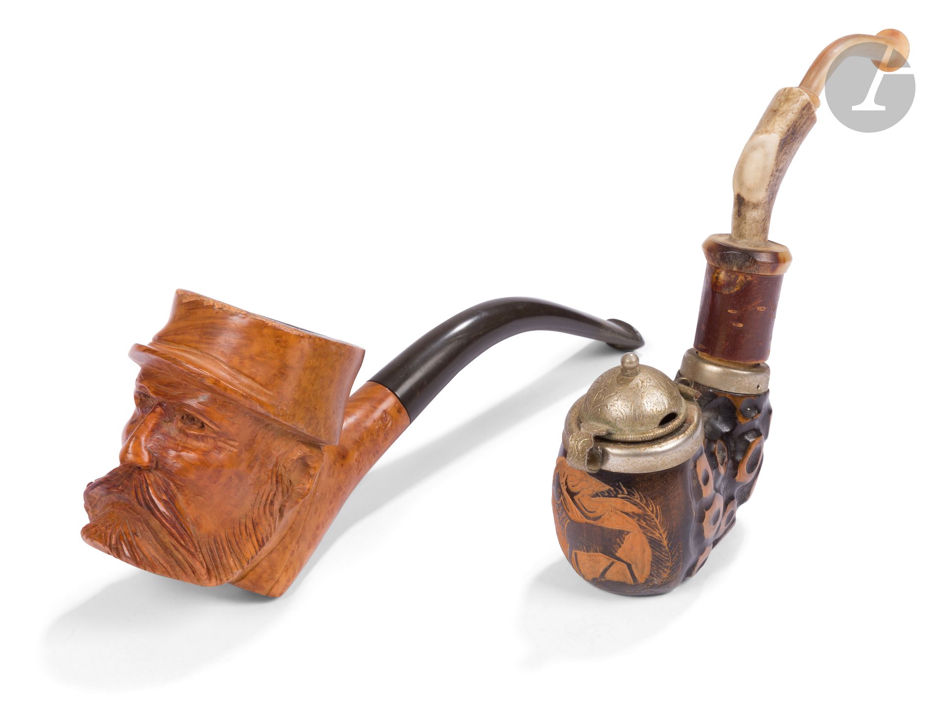 Deux pipes :
- en bruyère sculpté d’une tête de « poilu ».
- en bruyère sculpté d’un cerf.
B.E.
