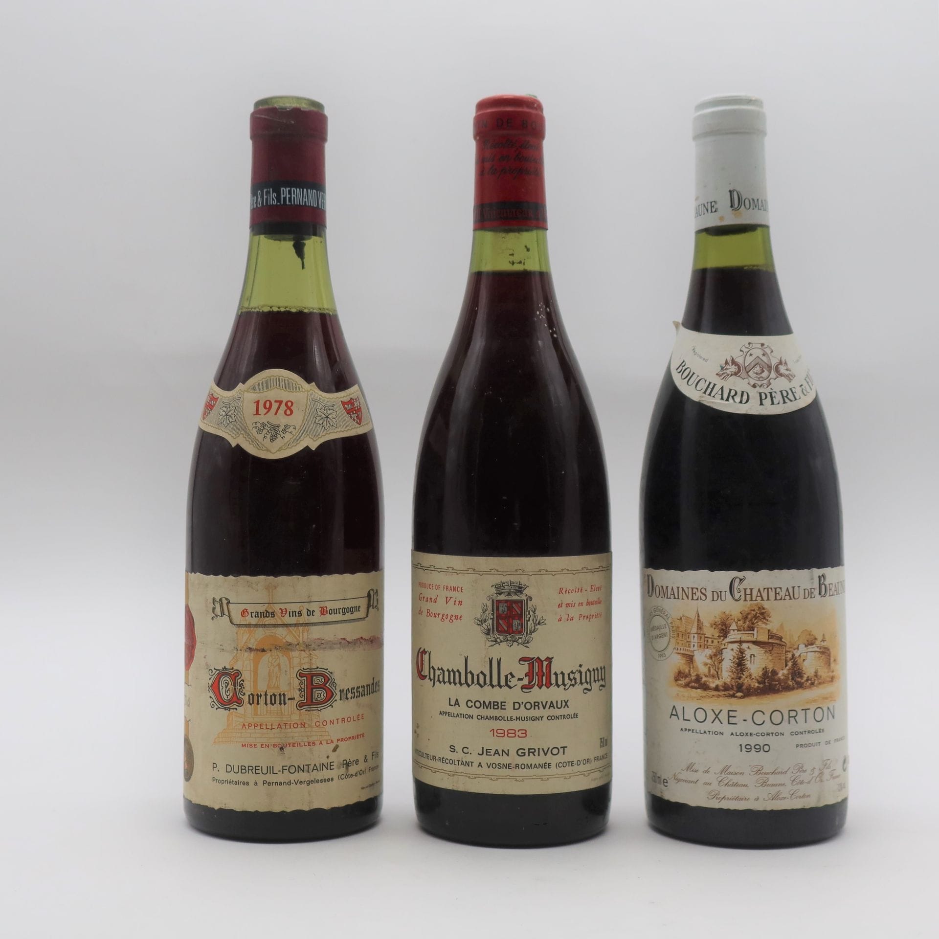 1 B CORTON-BRESSANDES (Grand Cru) (3,2 cm; e.t.h. légères, s.c. au sommet ; bouchon fragile engagé), Domaine Dubreuil-Fontaine, 1978
1 B CHAMBOLLE-MUSIGNY LA COMBE D'ORVEAU (e.l.s.), Domaine Jean Grivot, 1983
1 B ALOXE-CORTON (e.l.s.), Bouchard P&F, 1990