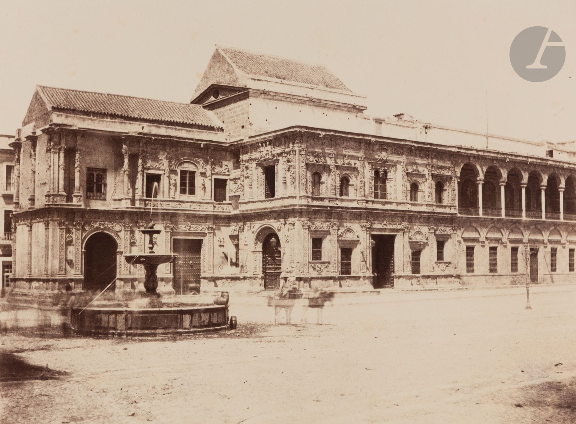 Louis de Clercq (1837-1901)
Seville, 1859-1860. 
Constitution Square and Palace of Justice. Plate no. 16.
Albumen print from a paper negative, mounted on card. Legend, numbering and photographer's coat of arms printed on the mount at bottom. 
21.2 x 28 cm 

 A similar print is in the Musée d'Orsay collections.