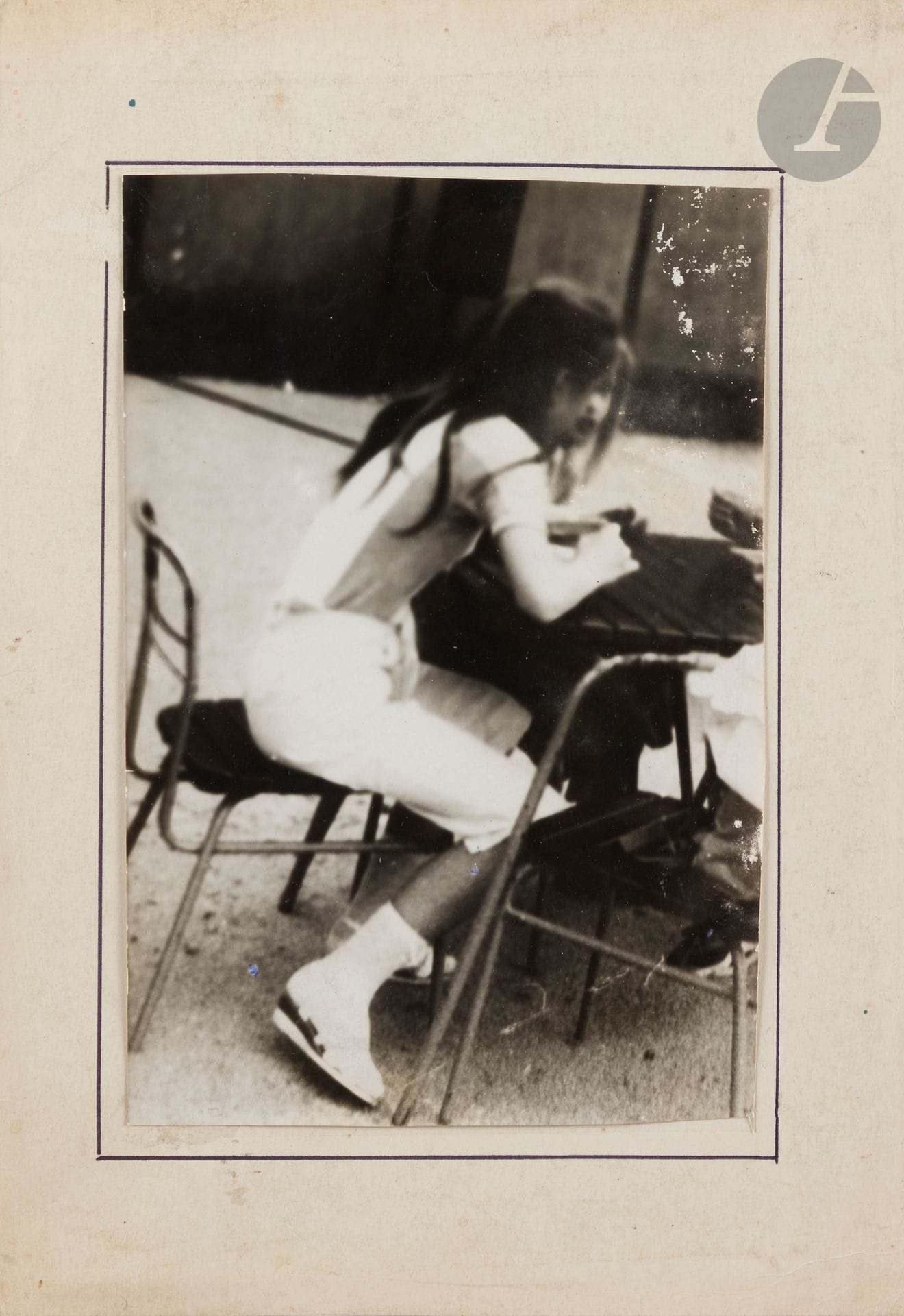 Miroslav Tichy (1926-2011)
Untitled [Seated Woman], c. 1980. 
Vintage silver print, mounted on cardboard by the photographer. Initials "J.O." (Jiří Olič) on verso. 
20.5 x 14 cm