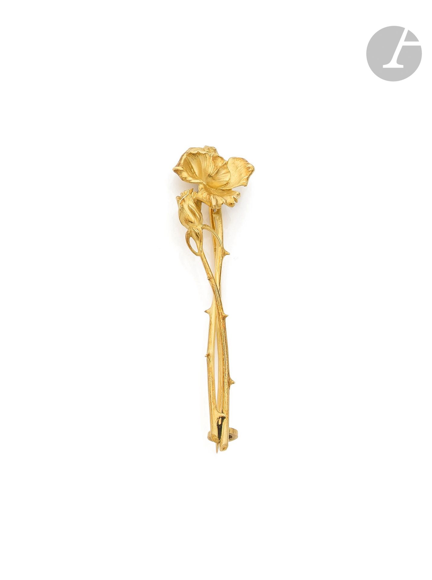 MIAULT
Broche en or 18K (750) dessinant une rose au naturel. Signée. Travail français du début du XXe siècle. Hauteur : 7 cm environ. Poids : 12,6 g

A Miault early 20th  century brooch